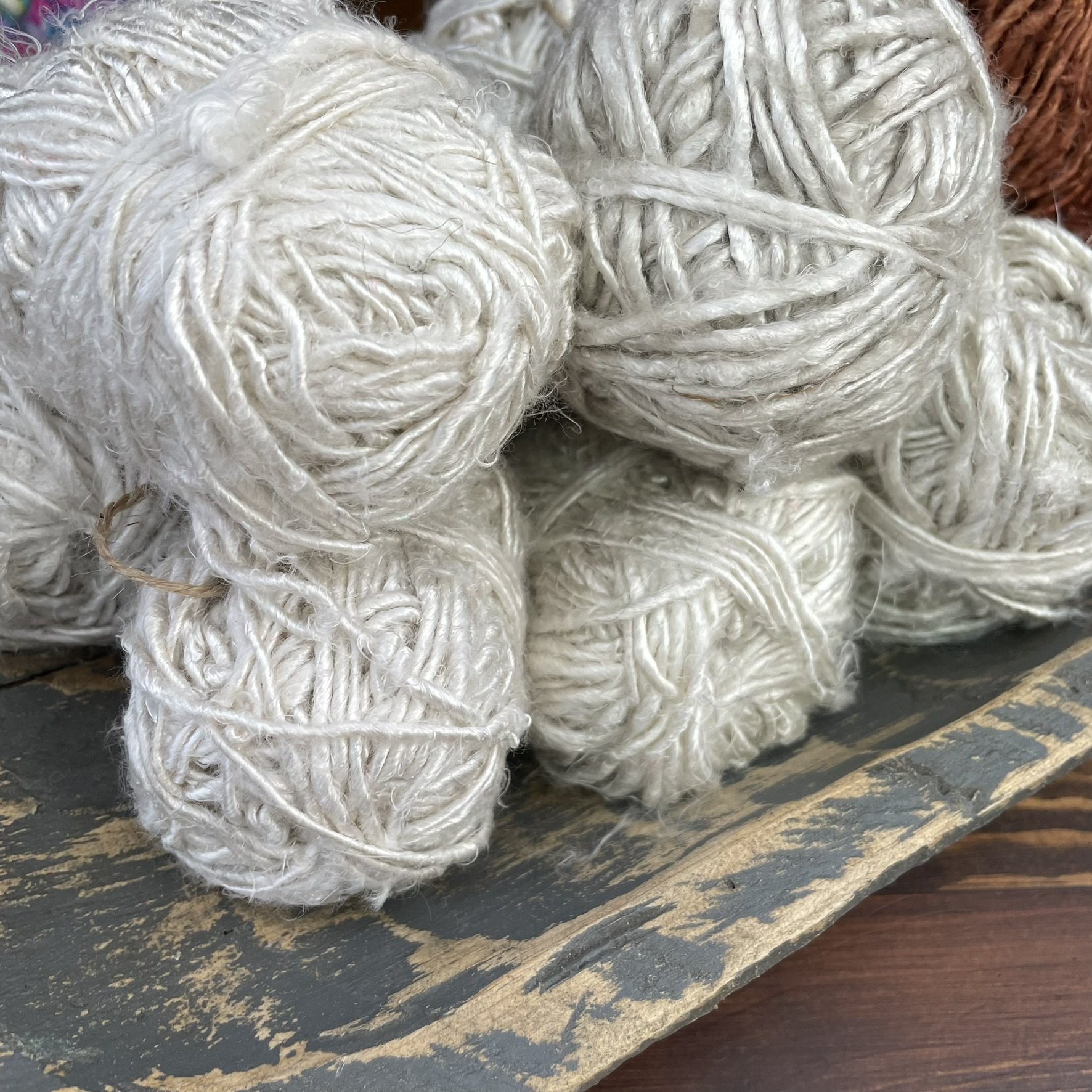 Banana fiber yarn in Ice White color, showcasing a soft and silky texture.