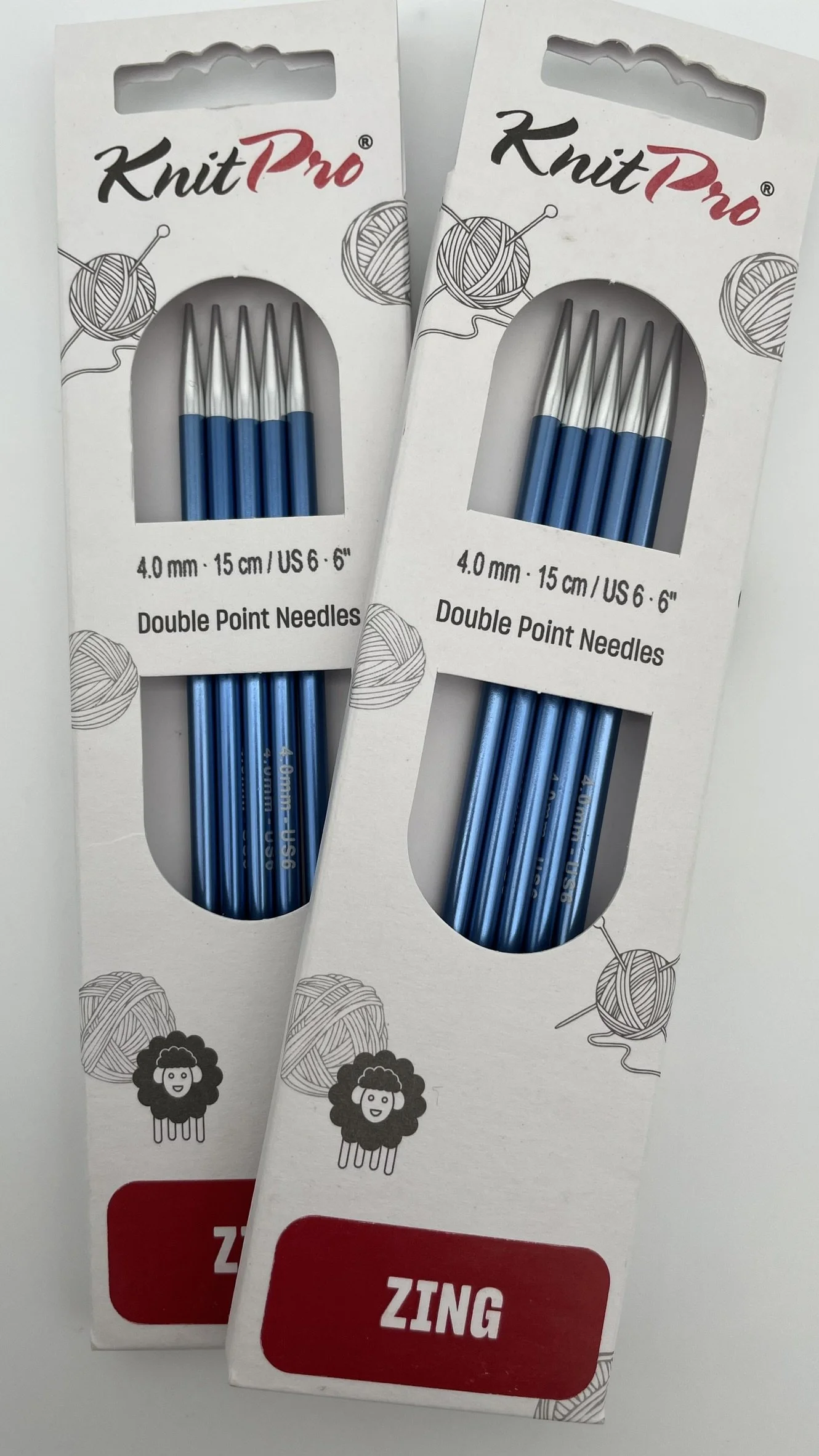 Two packages of blue KnitPro Zing 6" double point needles