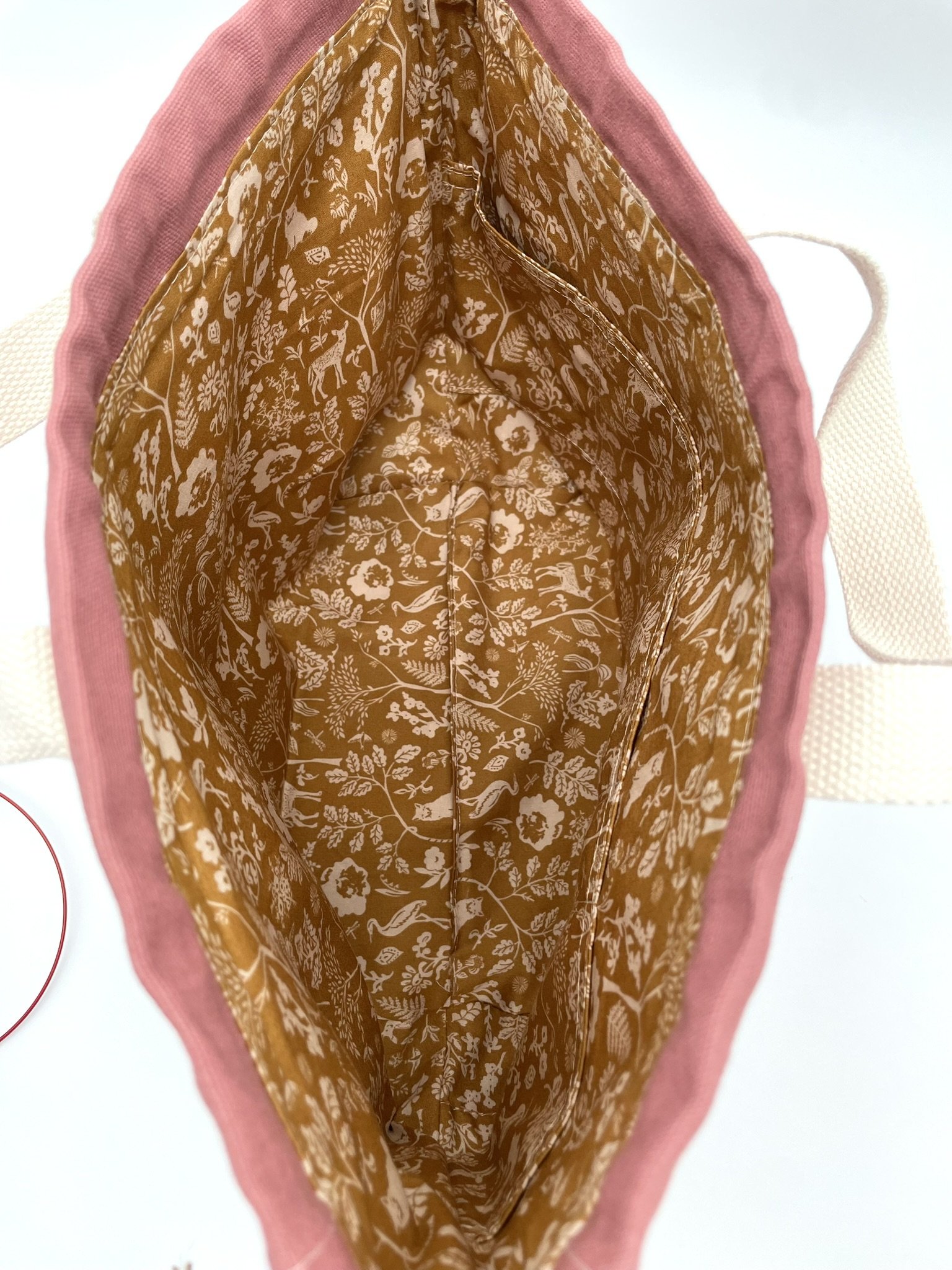 Top angle view of the large pink Puff Stitch project bag