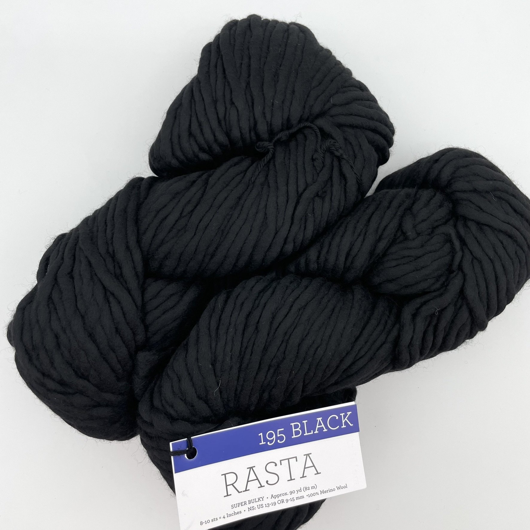 Malabrigo Rasta yarn in Black colorway, featuring deep black tones in super bulky merino wool for knitting or crocheting.