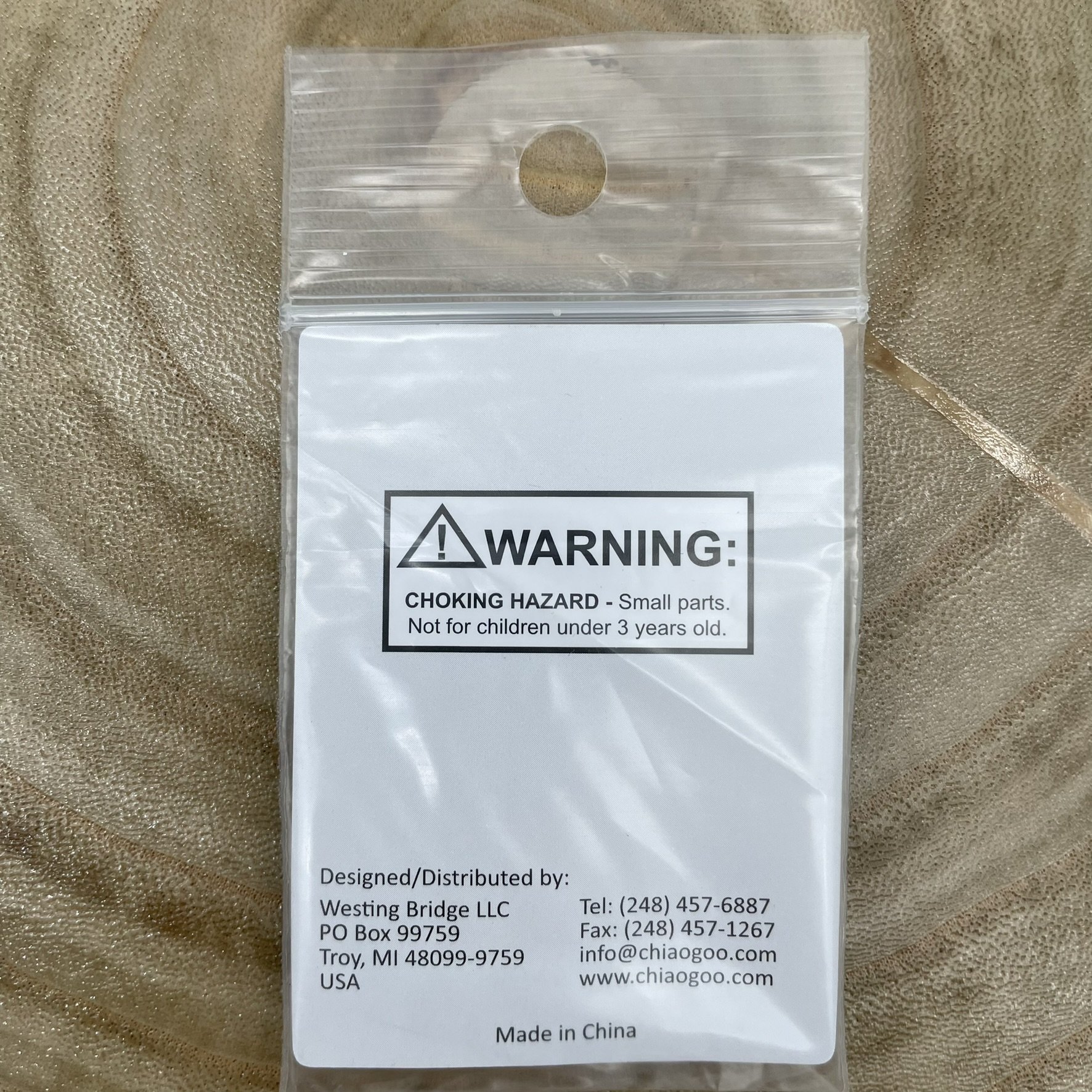 Back of the ChiaoGoo End Stoppers packaging, showing product warnings and company details.