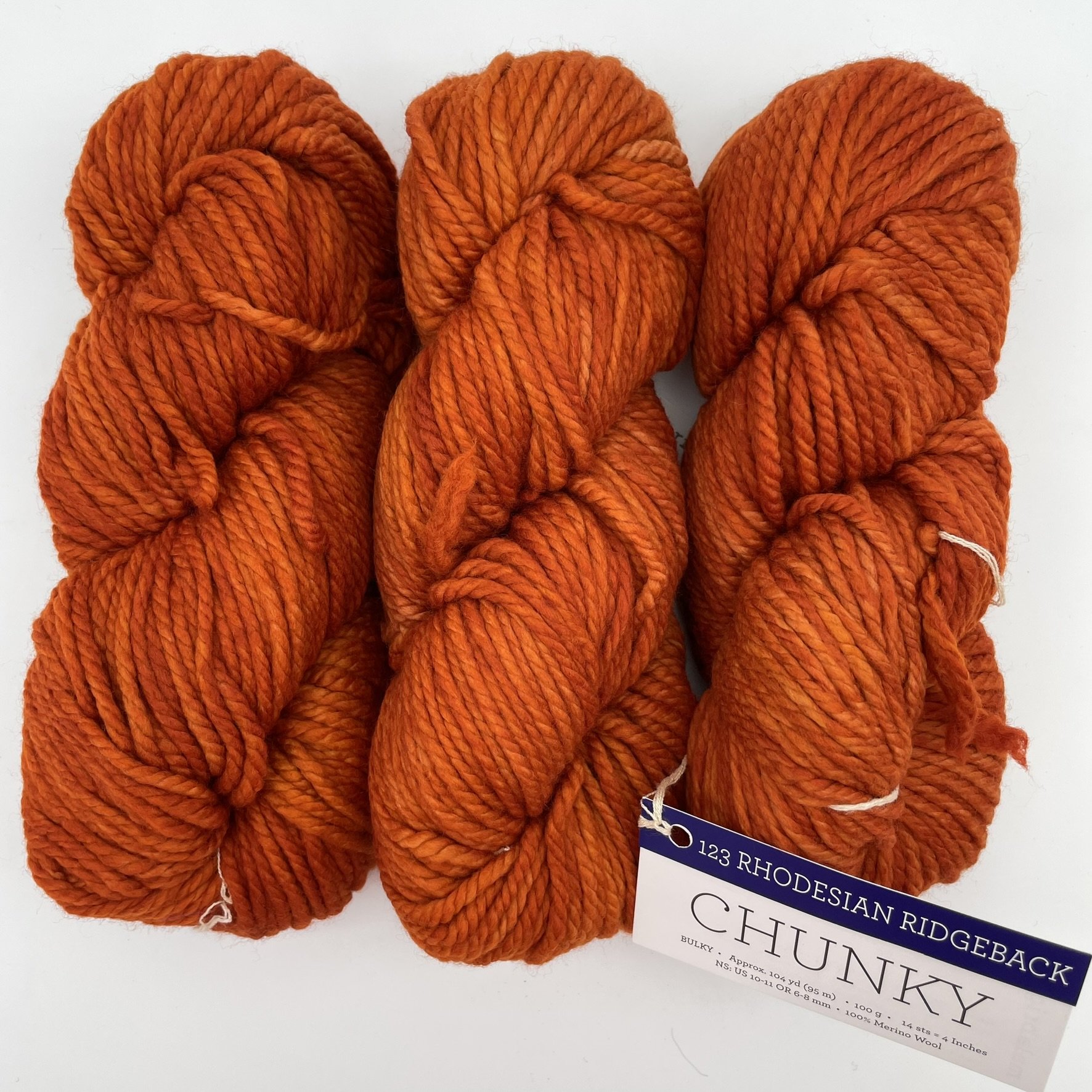 Malabrigo Chunky yarn in Rhodesian Ridgeback colorway, a rich orange bulky merino wool skein ideal for knitting or crochet.