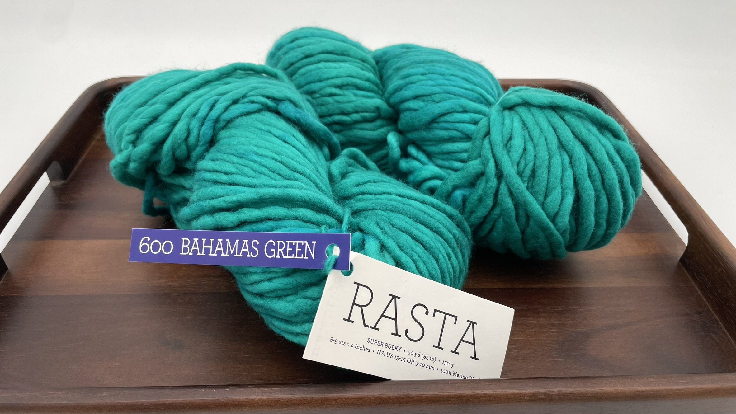 Second view of Malabrigo Rasta yarn in Bahamas Green colorway, a vibrant turquoise super bulky merino wool skein.