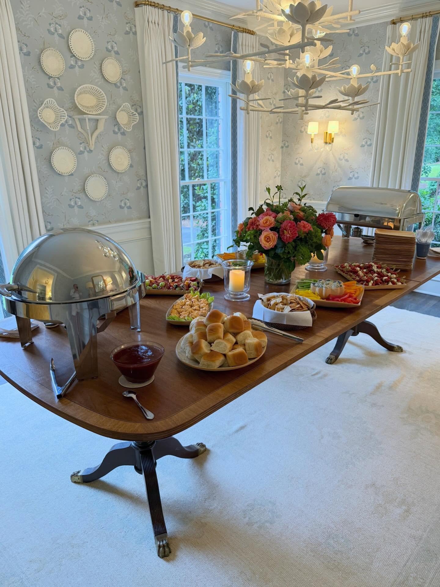 Only right for the dining room to be party ready too at our client&rsquo;s house! Family dining table, vintage rug, fresh wallpaper, drapery and lighting! Can&rsquo;t forget the plate wall too! One day we will photograph this house professionally, bu