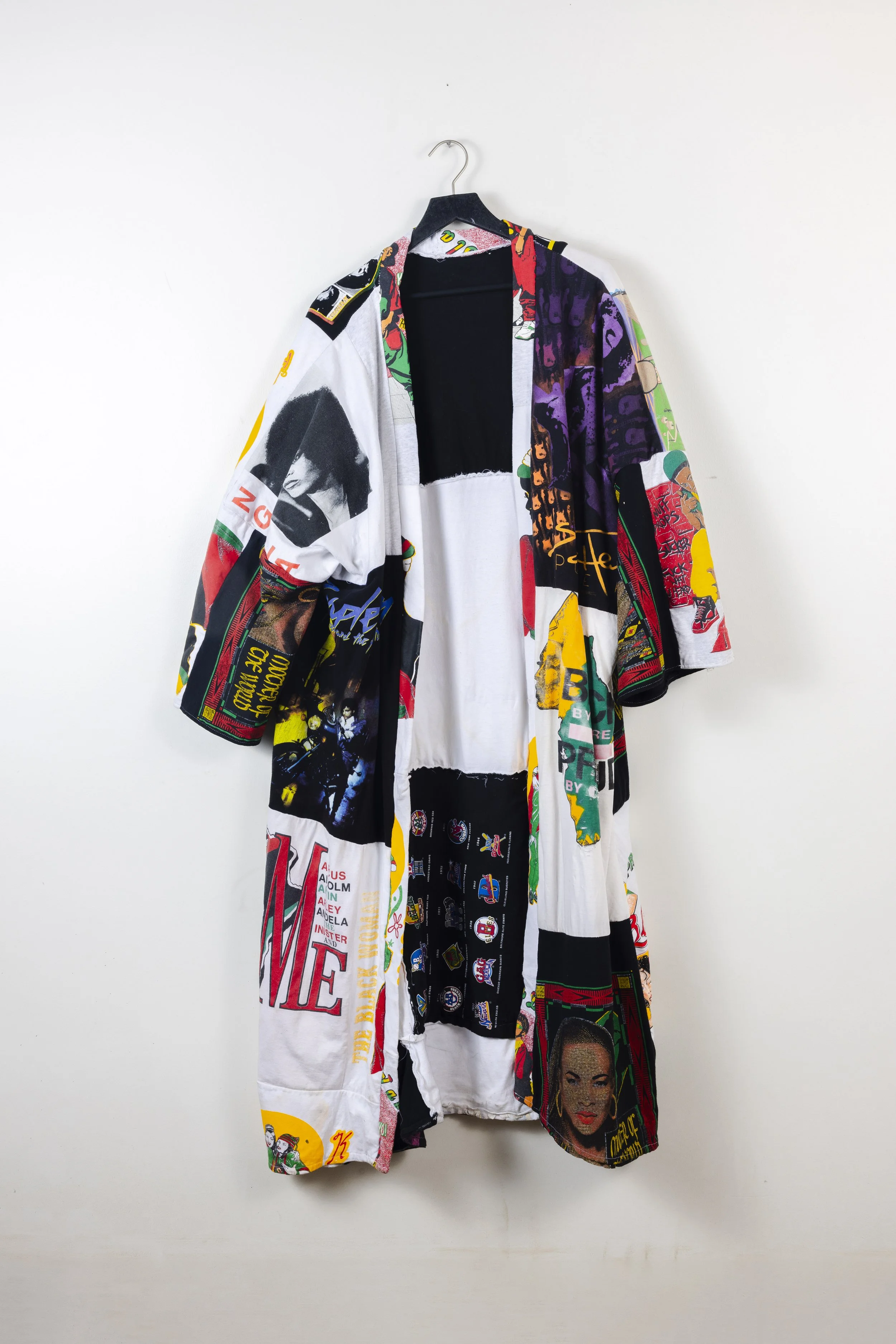 “Our History”
Originally created for Los Angeles Fashion Week, this kimono-inspired jacket is constructed from donated vintage Black History t-shirts. Each stitch weaves together heritage, celebrating the community’s achievements and enduring faith. 