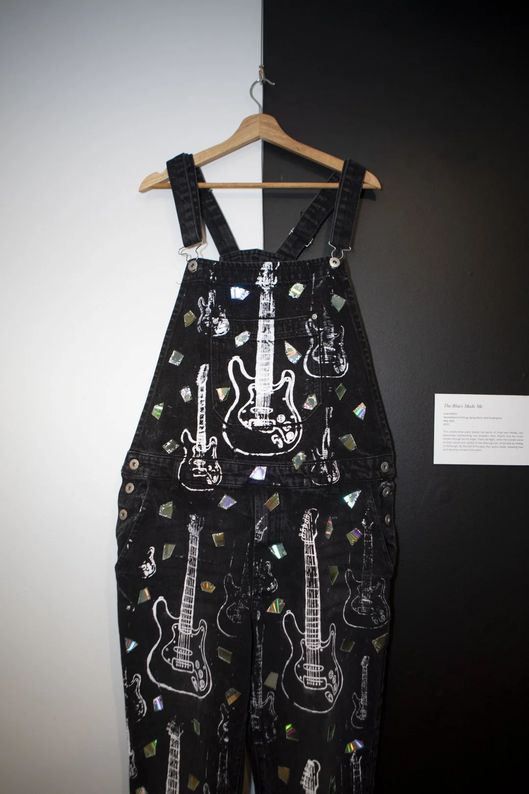 "The Blues Made Me"
This collaborative piece blends the spirits of Floyd and Hedley, two passionate, hardworking, and stubborn men. Floyd’s love for music echoes through his hit single, 'That’s All Right,' while the overalls serve as both canvas and 