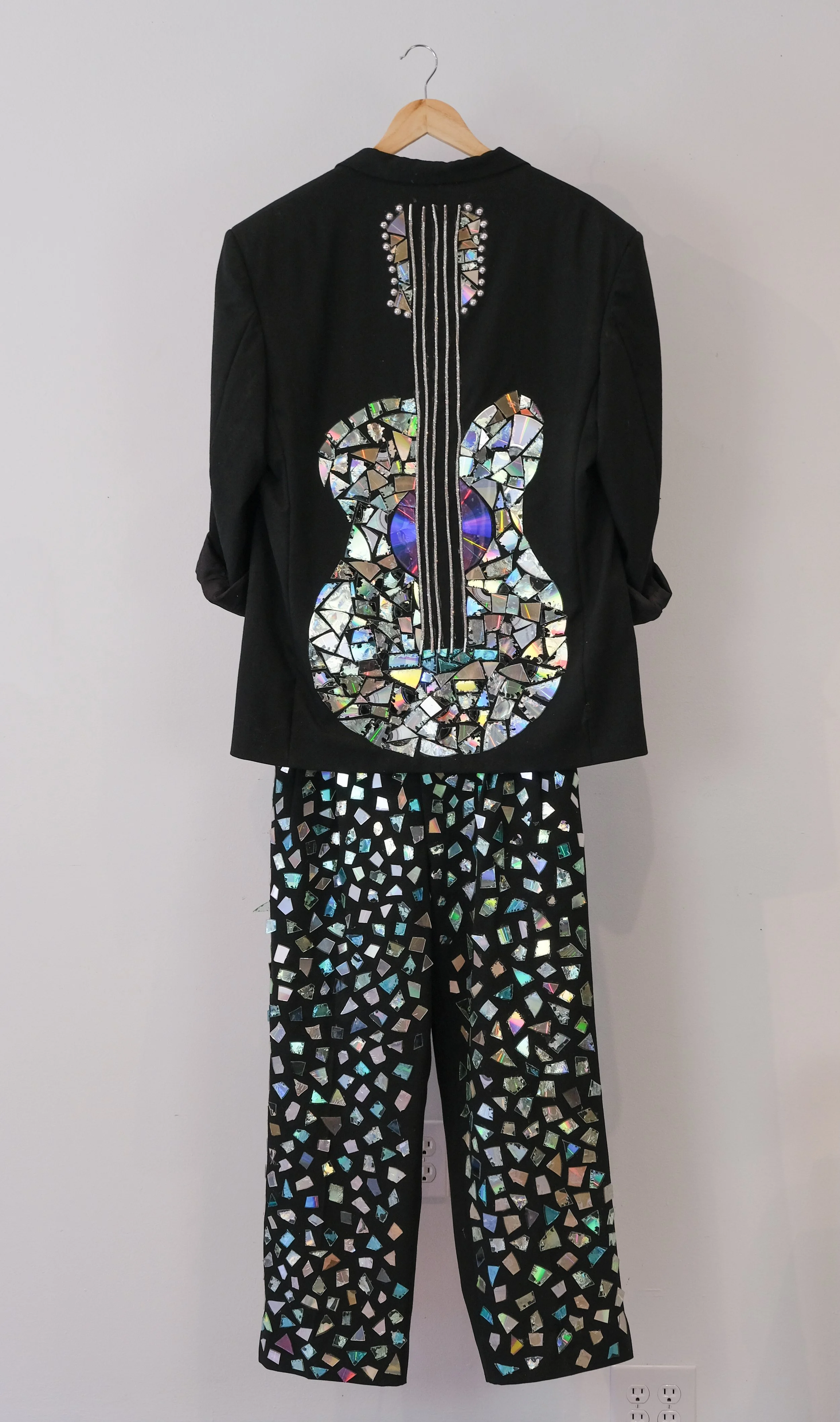 "Chasing Broken Dreams"
This outfit is inspired by Floyd from August Wilson’s Seven Guitars. He’s chasing music, money, and ultimately, a second chance. His life experiences have shaped a fractured view of what life should be versus what it really is