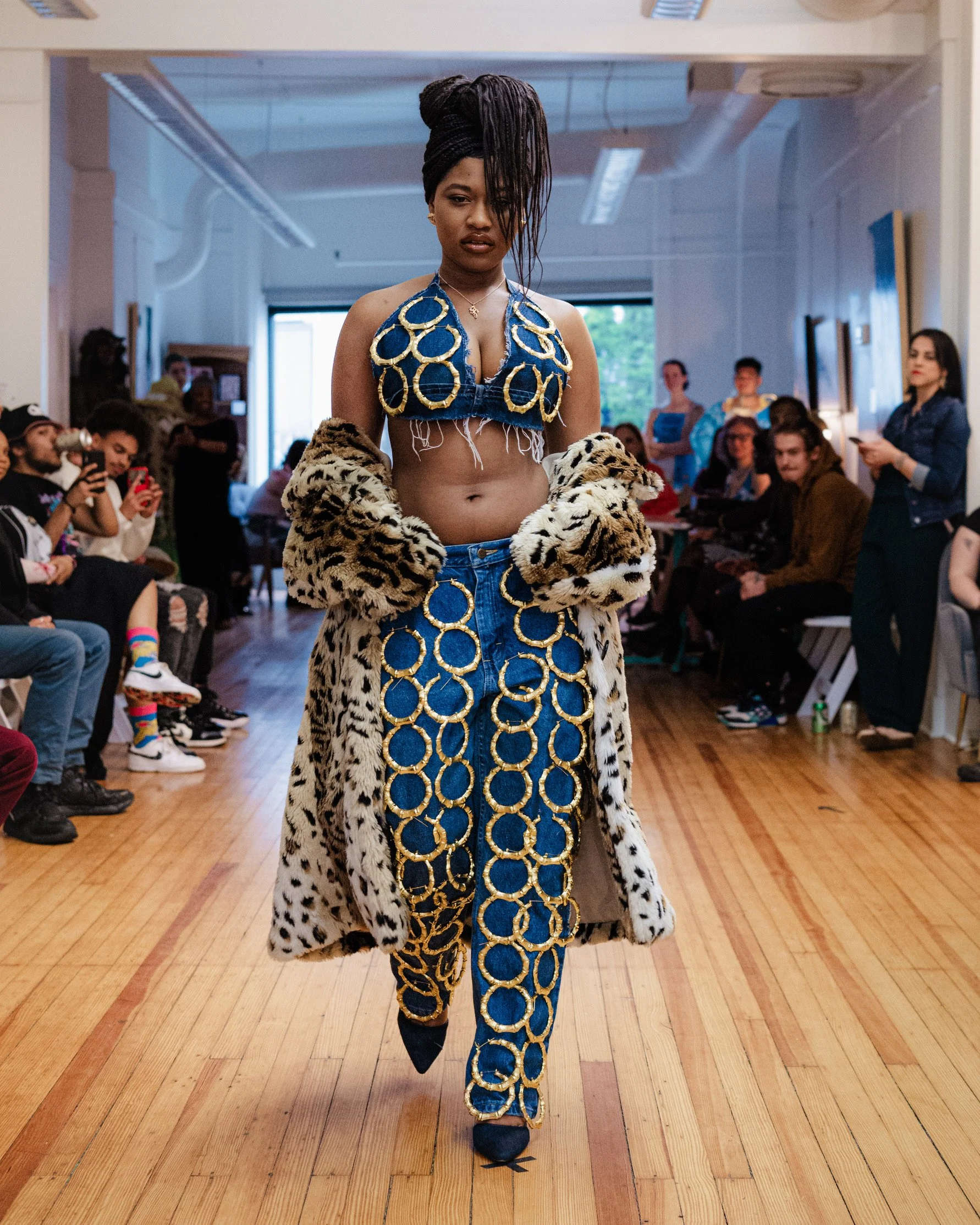 “Around the Way” Set
Created for the GRWM Runway Collection, this set features hand-sewn bamboo earrings on upcycled and secondhand denim. The garment celebrates the boldness and maturity embodied by the iconic bamboo earring—a staple in the Black co