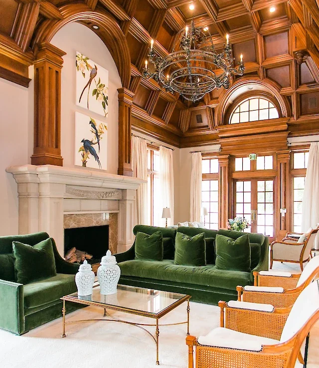 luxury-living-room-green-velvet-sofas-coffered-wood-ceiling.640x739.webp