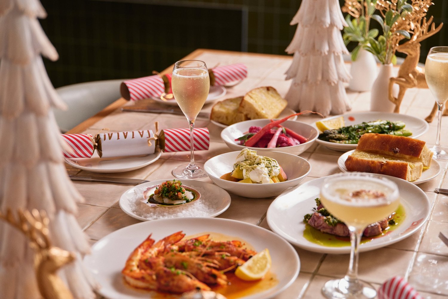 A shared festive feasting spread on a Christmas table