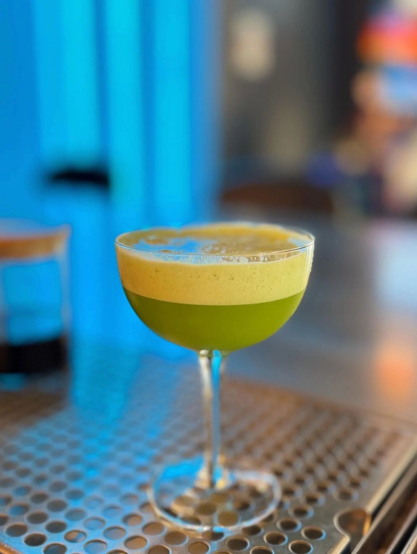 Have you stopped by for a Halloween cocktail yet? 🎃 This eerie green creation, the &ldquo;Swamp Thing&rdquo; by our bartender Grant. This spooky sipper is made with Gin, Passionfruit Liqueur, Falernum, Lemon, Lime, Lavender Bitters, and topped with 