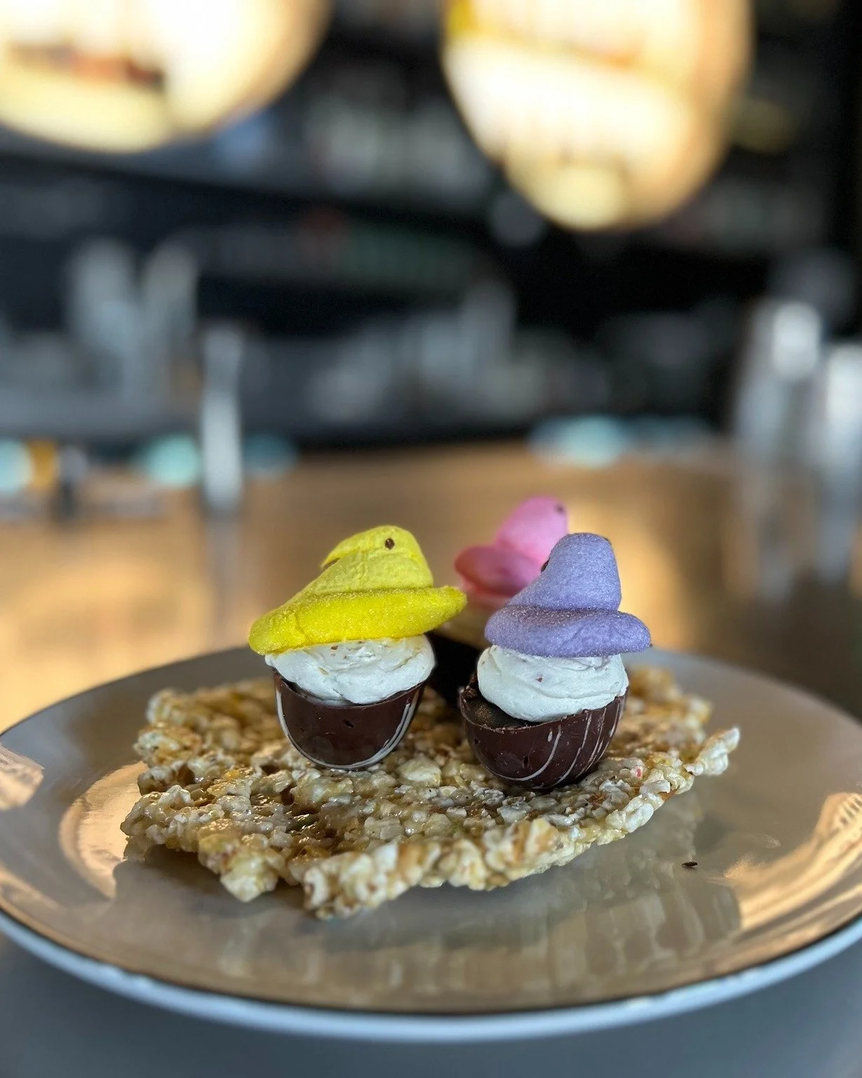 Little Easter treat we whipped up for y'all. Available tomorrow only so come and get em!

Striped Chocolate Egg Shell
Toasted Milk Buttercream
Popcorn Marshmallow Nest
Peeps