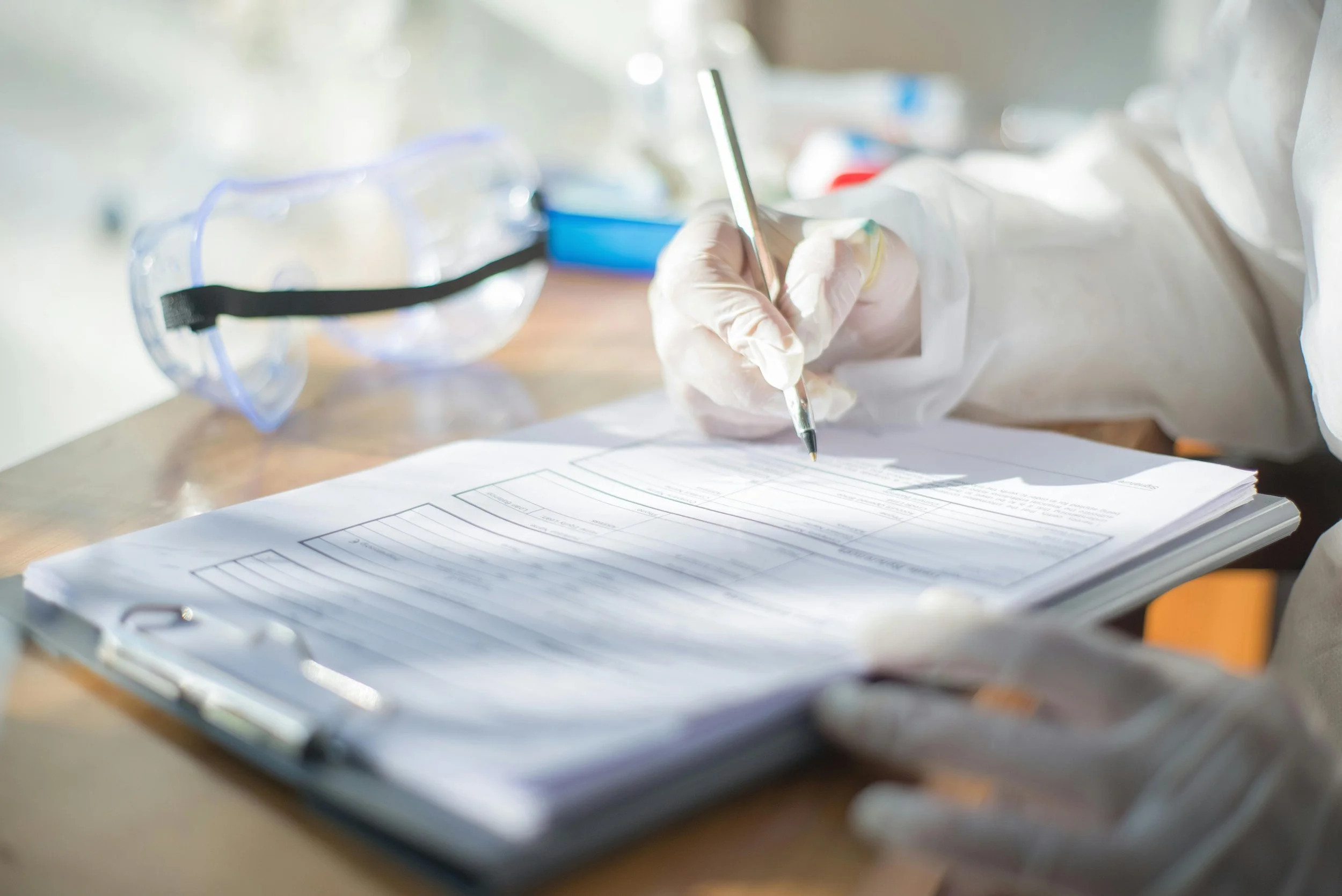 Medical staff reviewing patient records and documentation in a clinic, representing GP consultations and healthcare services in Sydney