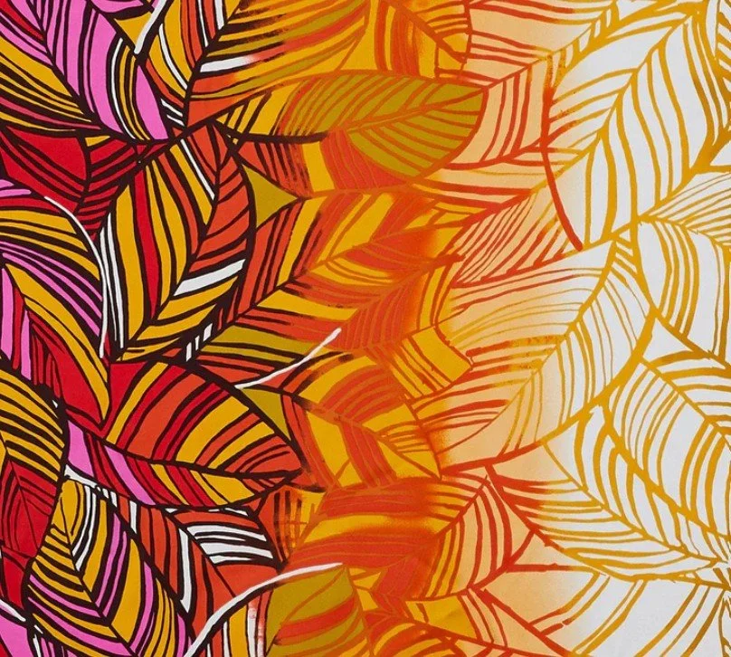 Full color illustration of overlapping leaves with fuchsia, black, yellow, red, orange and white showing the full fabric pattern of the Fuchsia & Orange "AWE" Scarf.