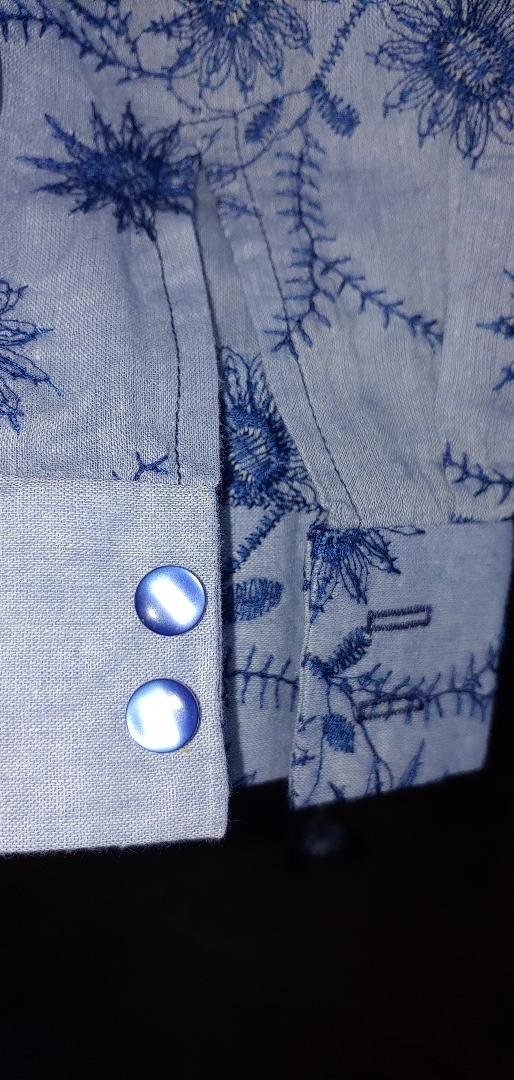 Floral Embroidered Blouse in Blue Sky Cuff with Buttons.jpg