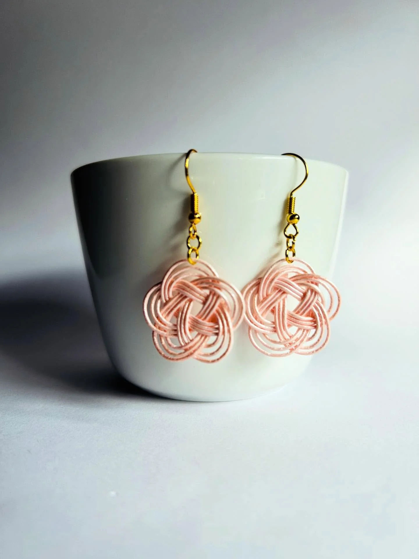 New design 📣 
Handcrafted with traditional Japanese Mizuhiki cords, these earrings capture the gentle beauty of cherry blossoms 🌸 

The soft pink tones bring the joy of spring to your everyday style. 
Lightweight and comfortable, they are perfect f