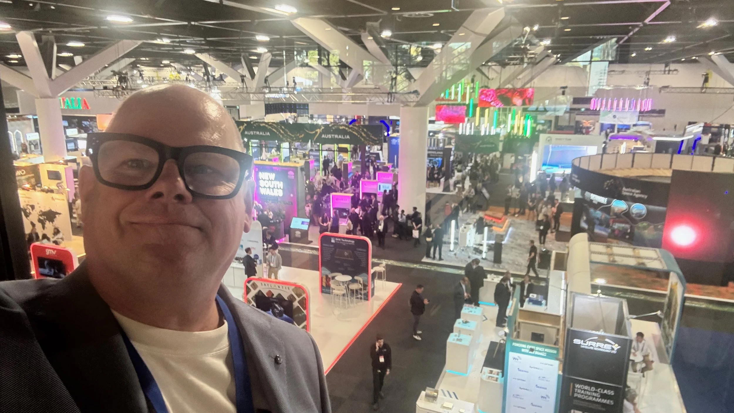 Wayne Cunningham overlooking the IAC 2025 exhibition floor at Sydney ICC