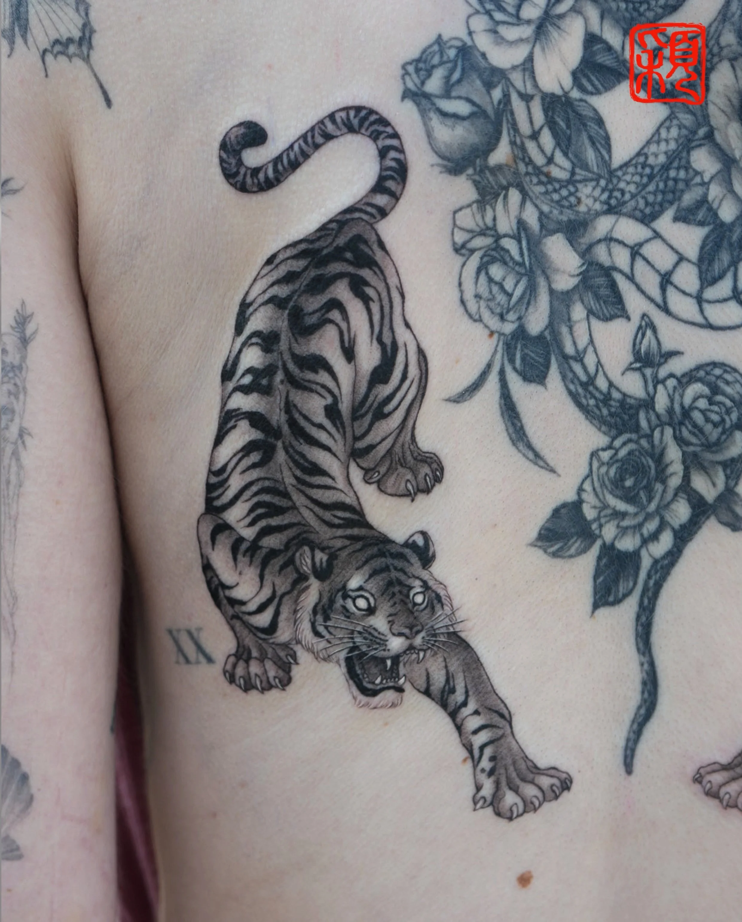 Twin tigers designed to create balance across the entire back composition.

Custom work by Gloria.
Los Angeles.

#tigertattoo #orientaltattoo #backpiece #chinesetattoo #tattooartist