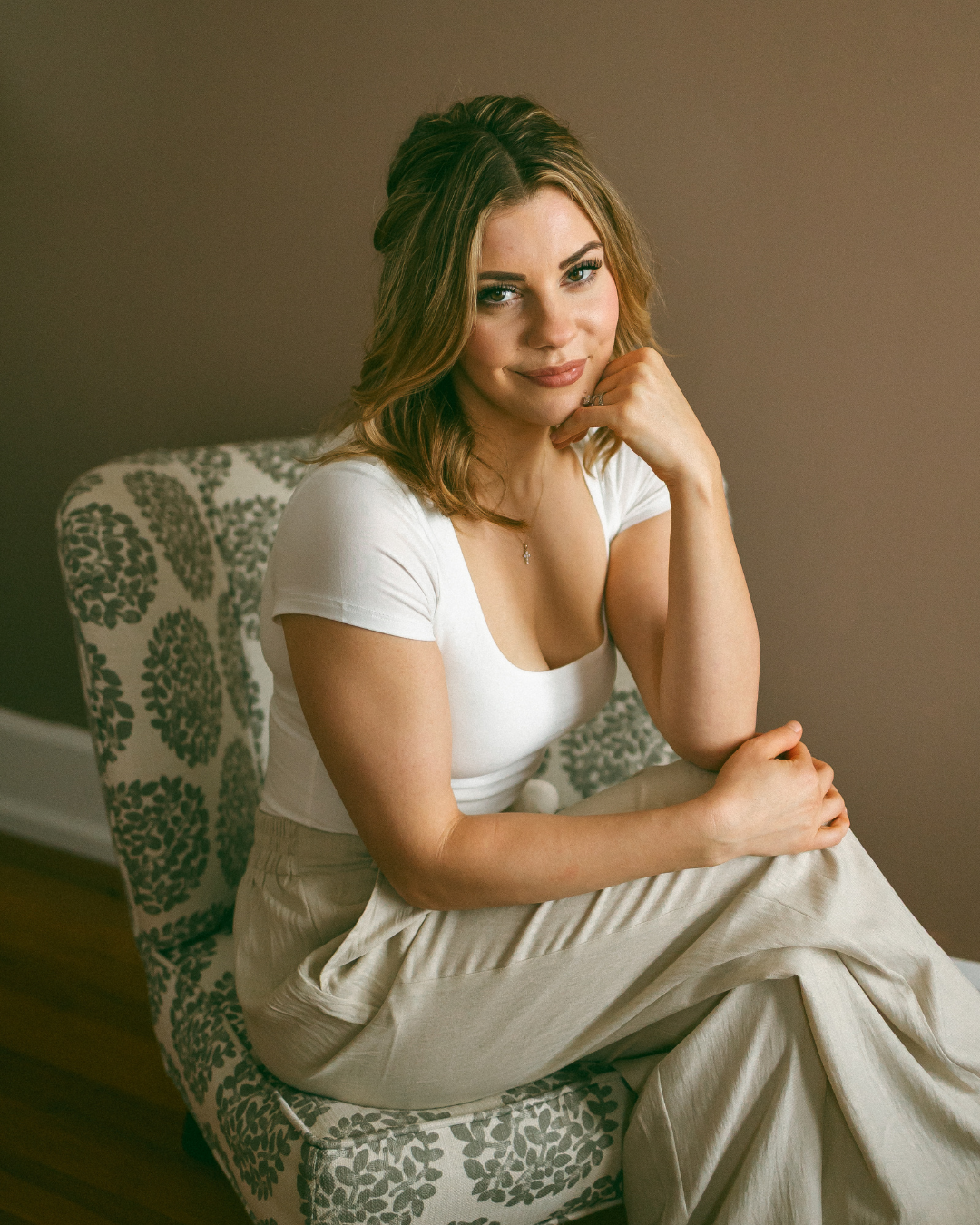 Kathleen Hixon providing a luxury massage experience inside Willow & Ivy Salon and Wellness Collective