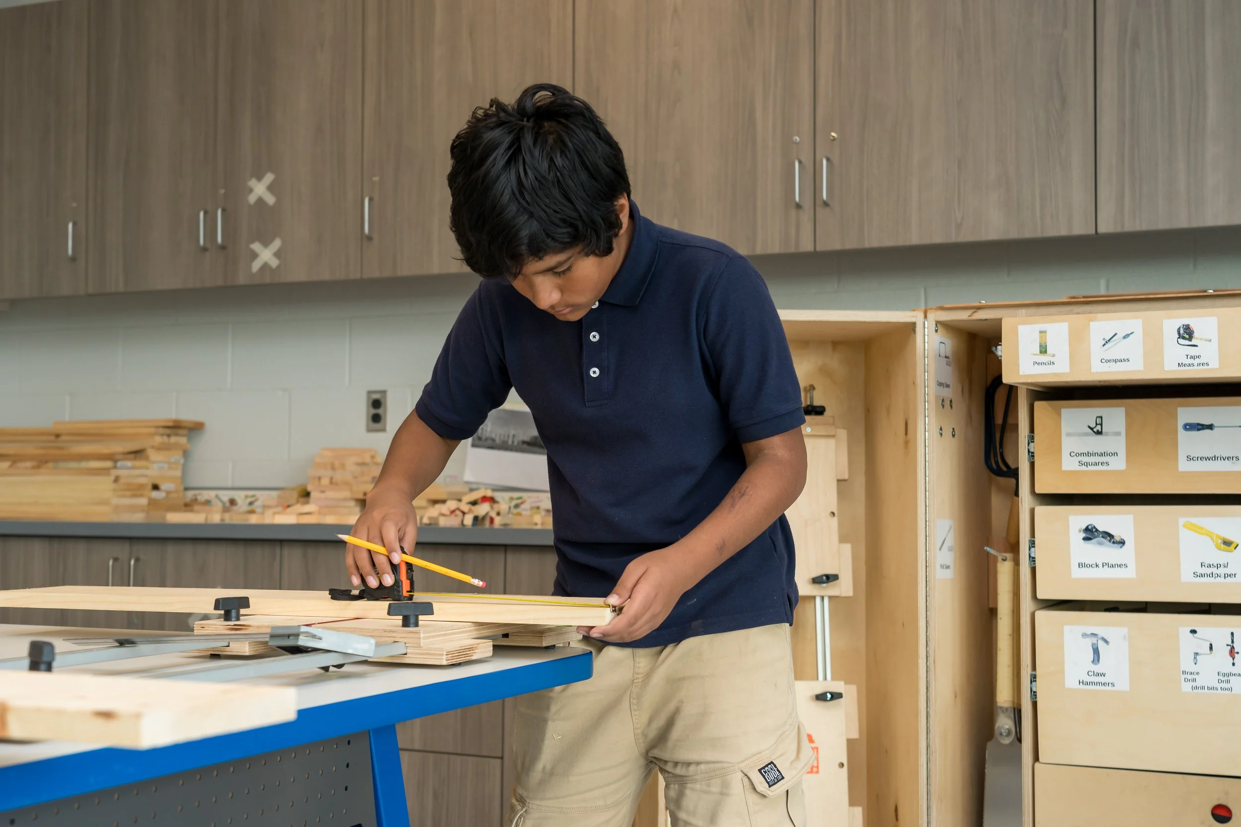 Student setting up his working space