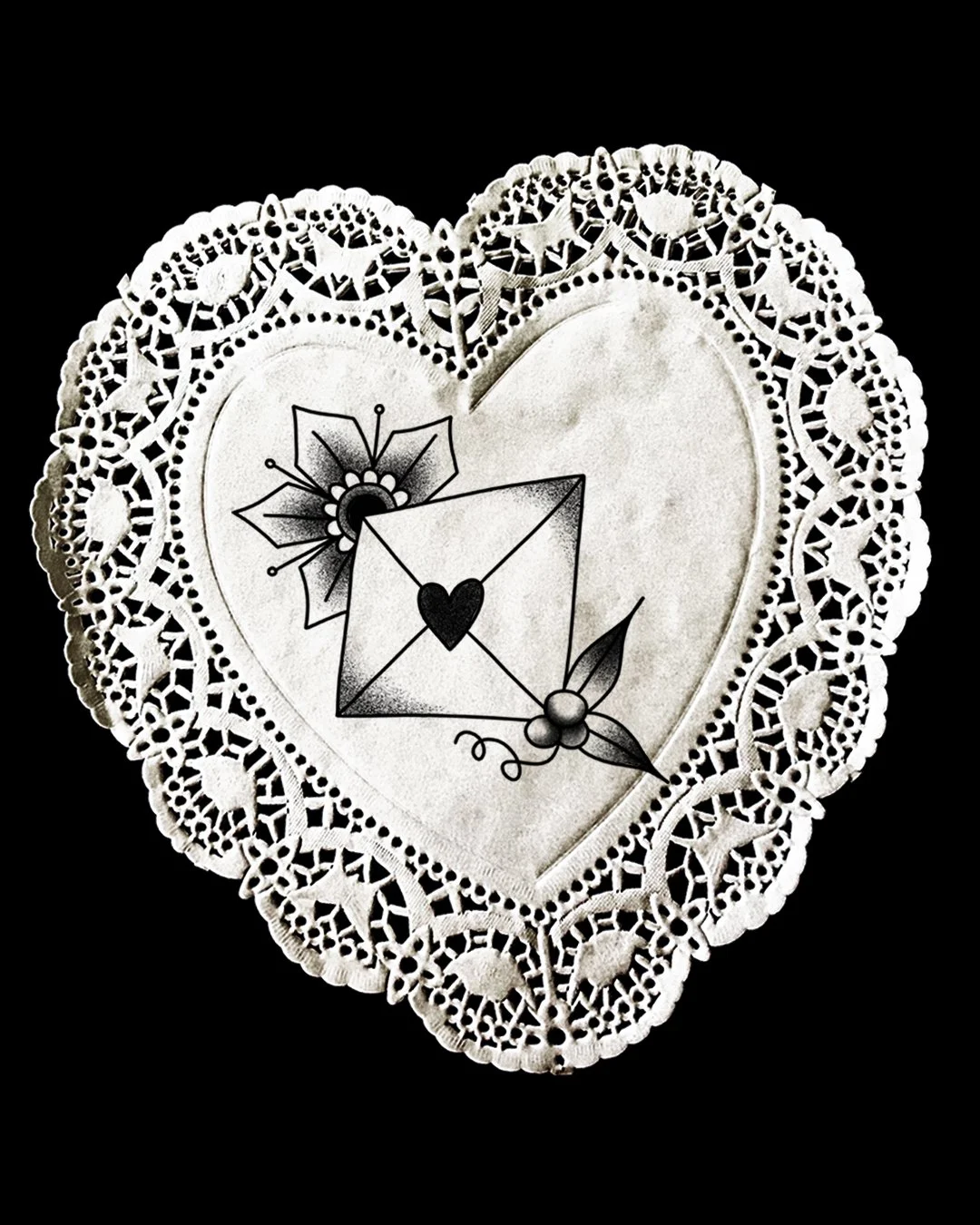 Decorative heart-shaped doily with a floral tattoo design, including a paper envelope with a heart seal, surrounded by lace patterns.