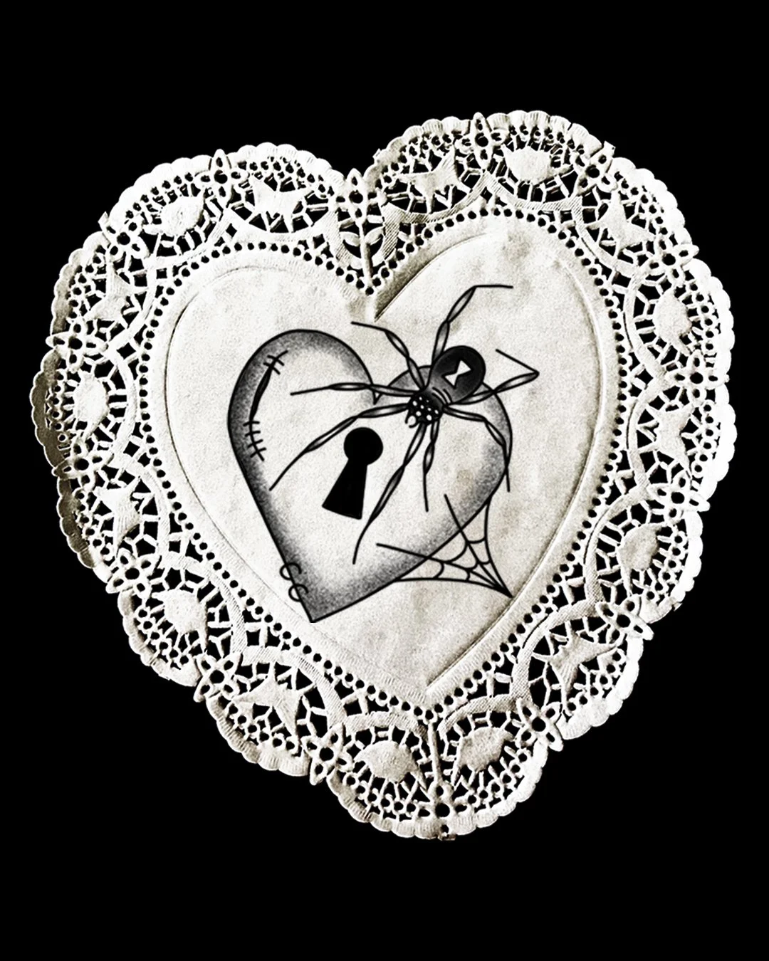 Hearts with a keyhole, a spider, and a spider web surrounded by a decorative lace border on a black background.
