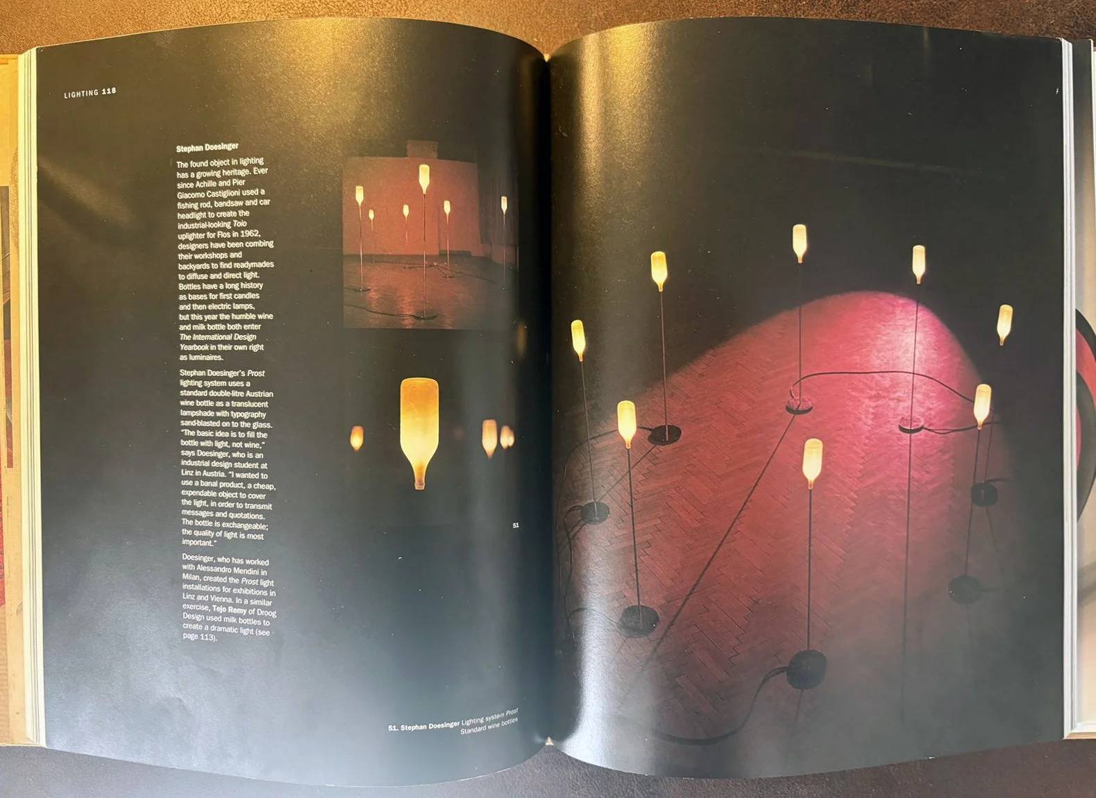 Text from the Int. Yearbook of Design:

Stephan Doesinger

The found object in lighting
has a growing heritage. Ever
since Achille and Pier
Giacomo Castiglioni used a
fishing rod, bandsaw and car
headlight to create the
industrial-looking Toio
upligh