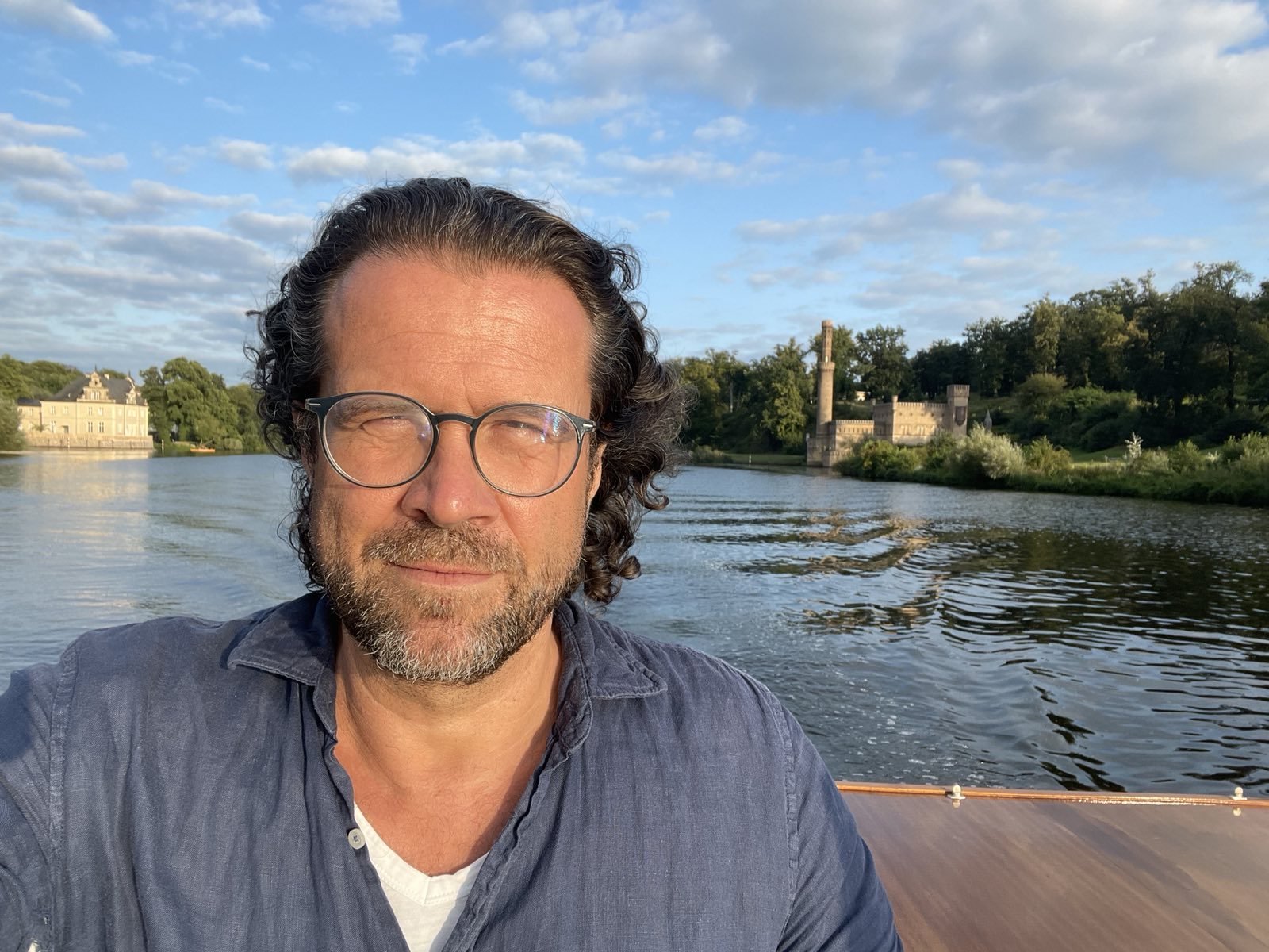 Stephan Doesinger steering the boat at the Wannsee in Berlin visting castles nearby...