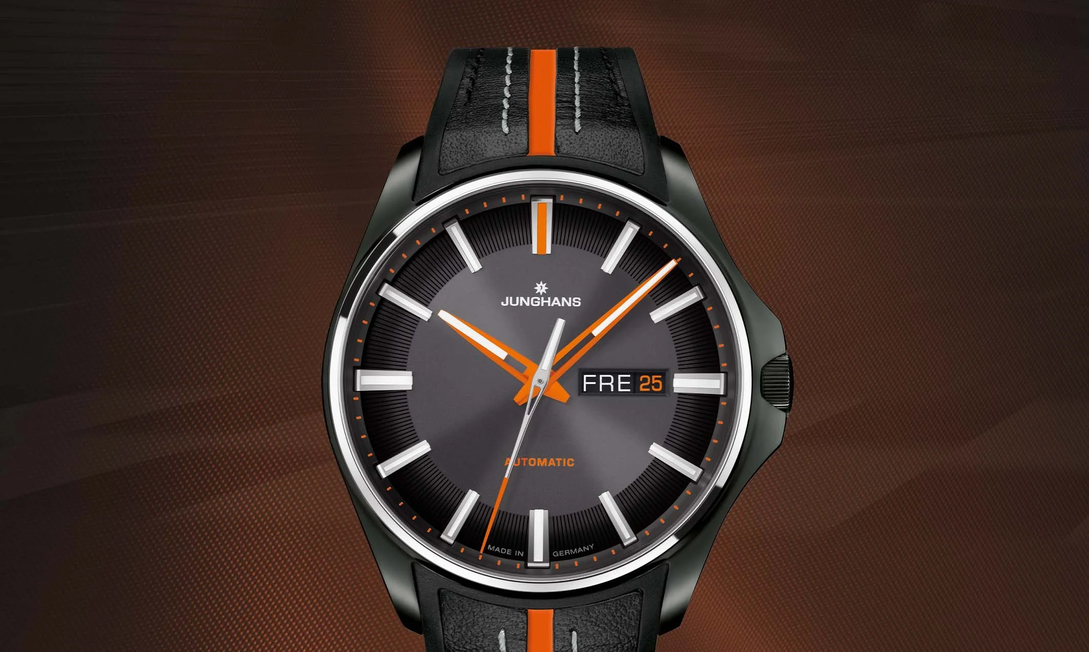 THE NEW MEISTER S AUTOMATIC BY JUNGHANS IS IMPRESSIVEWITH ITS BOLD BLACK AND ORANGE COLOUR SCHEME