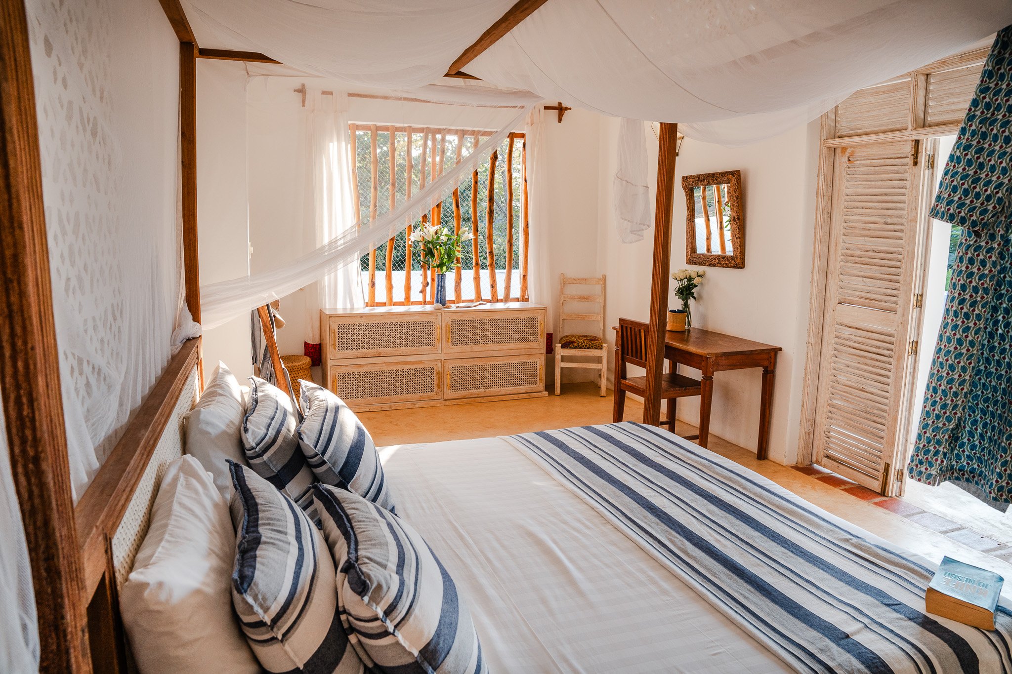 Master upstairs bedroom with en-suite bathroom, surrounded by ample balcony space.
