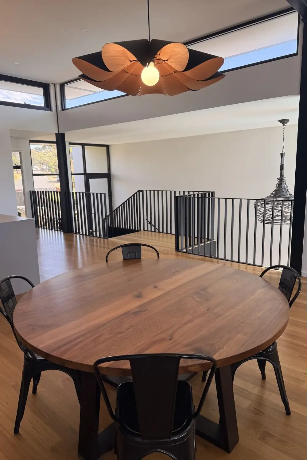 Tasmanian blackwood round dining table in our clients home in Torquay, Victoria. Hand made on the Surf Coast by Georgie Wood.