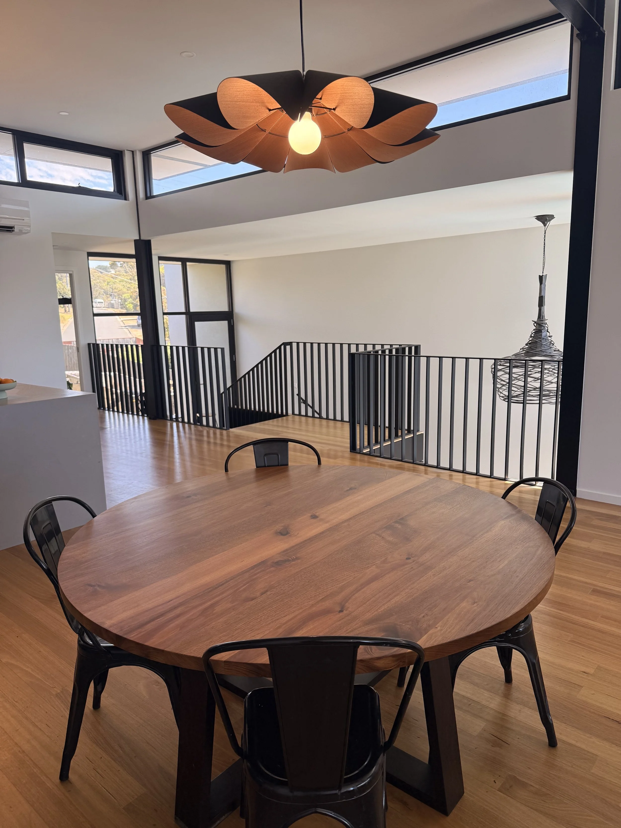 Tasmanian blackwood round dining table in our clients home in Torquay, Victoria. Hand made on the Surf Coast by Georgie Wood.