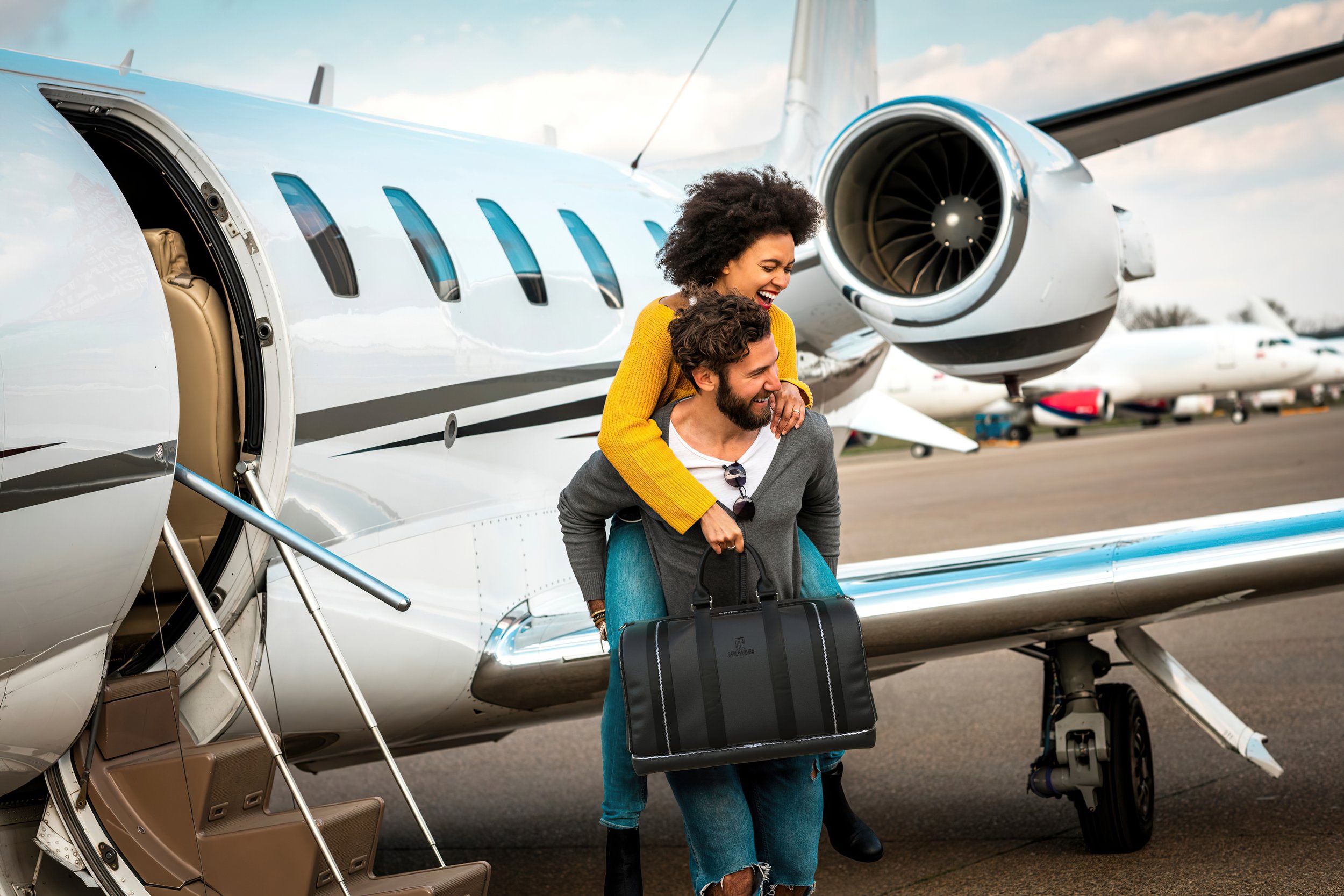 Bag_Couple private jet.jpg