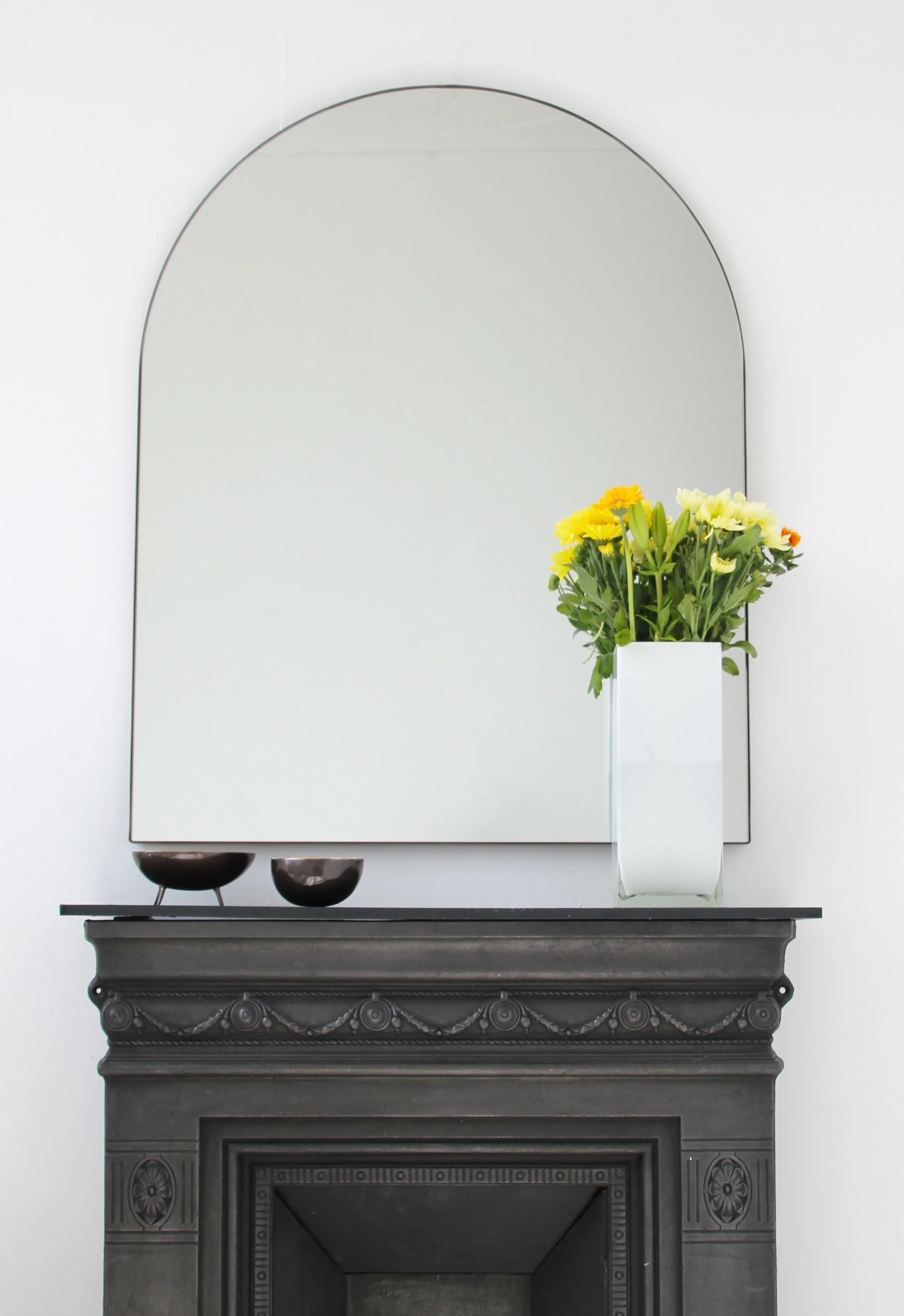 How to Display Your Mirror Above a Fireplace