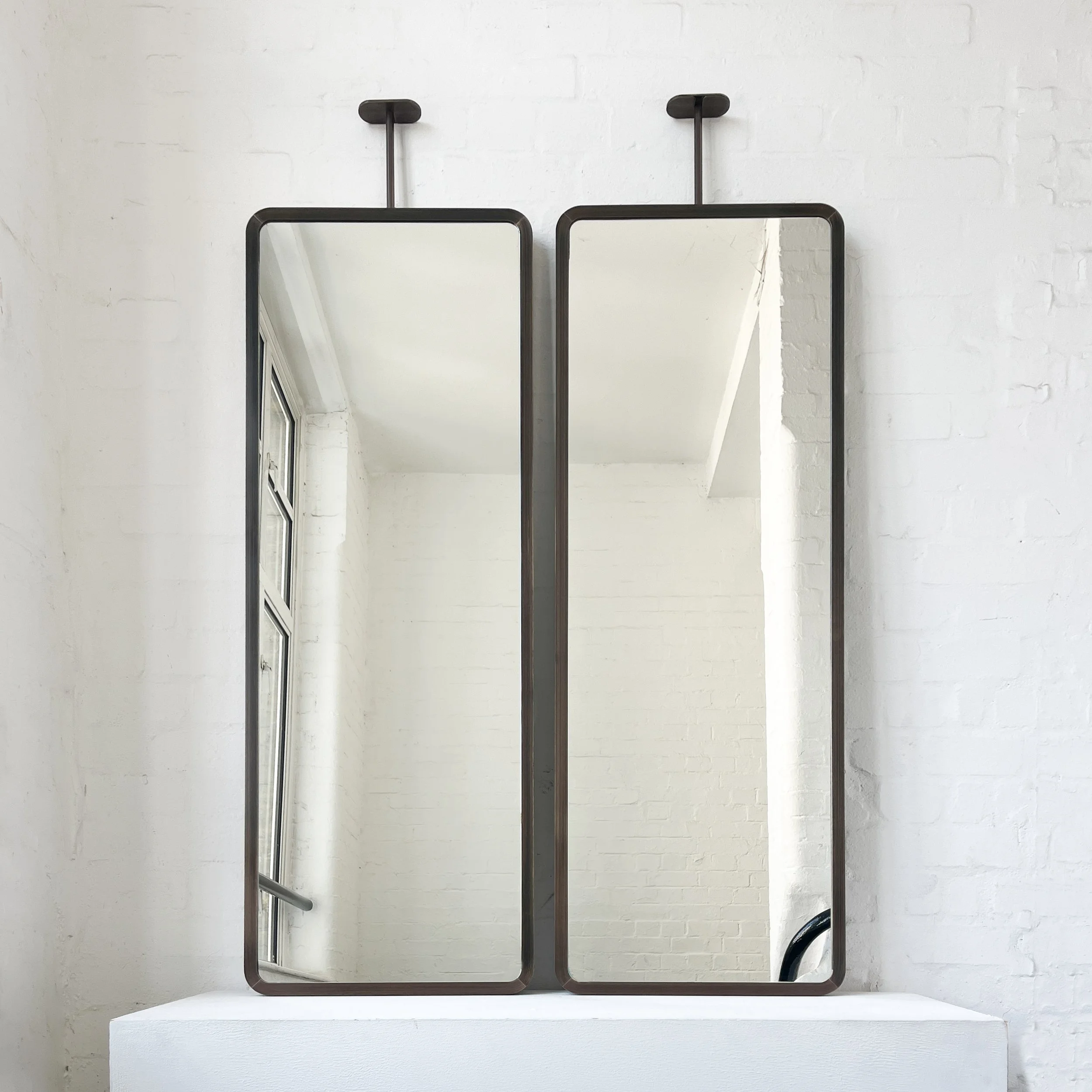 Alguacil_Perkoff_Ceilings_Suspended_Quadris_Long_Mirror_Full_Bronze_Patina_Brass_Frame-2.jpg