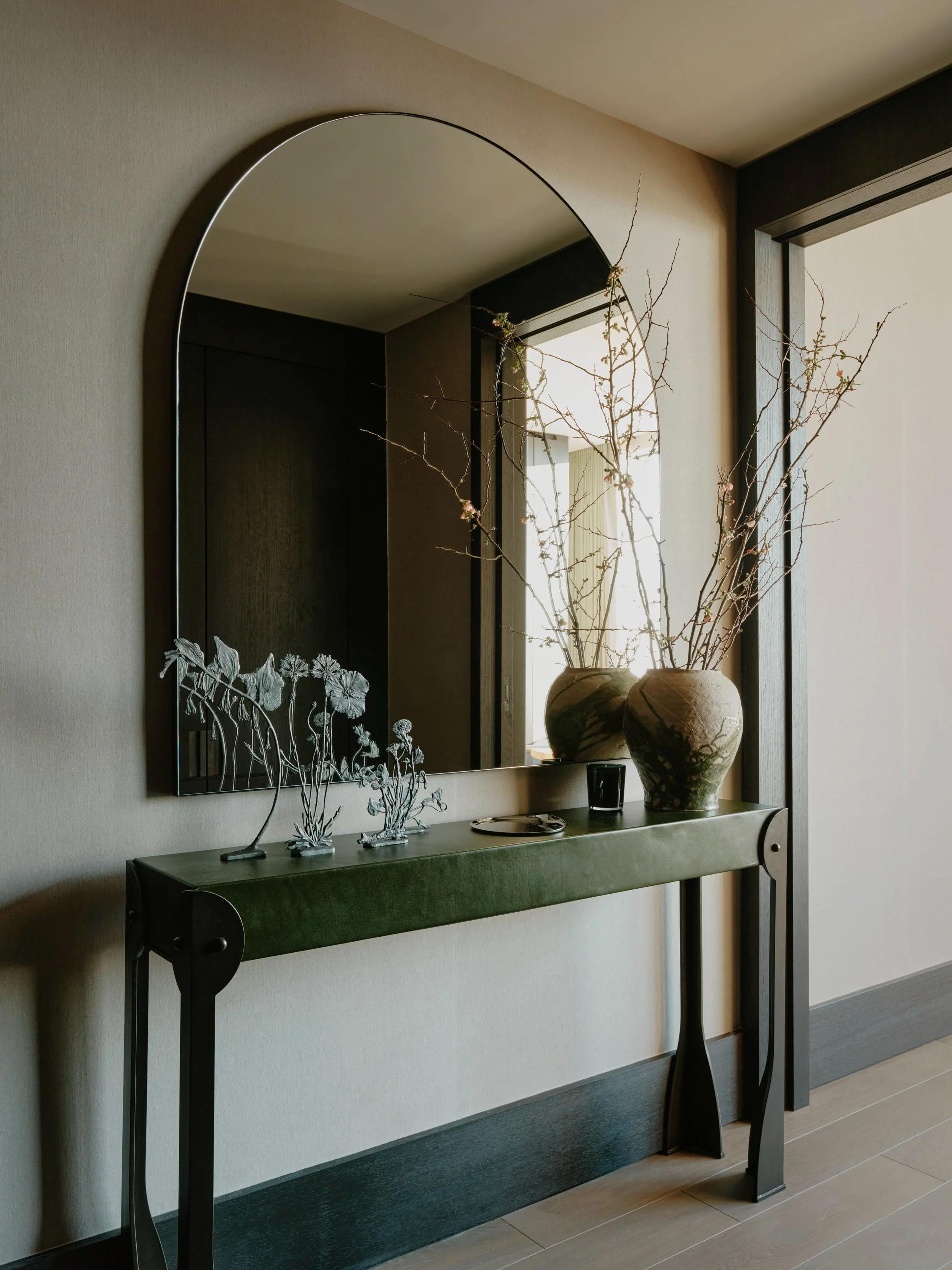 Arched Over-Size Wall Mirror Above a Console