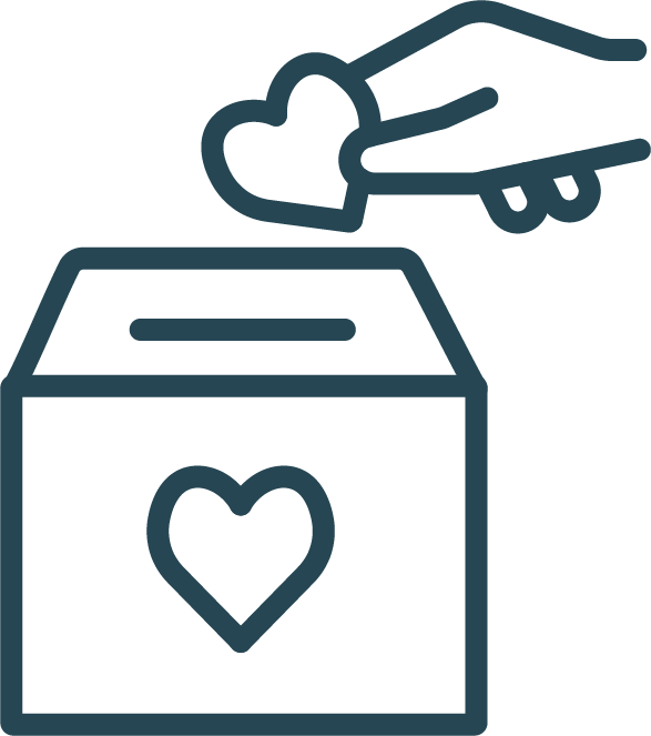 A donation box with a heart symbol on it being filled with a heart-shaped object from above.