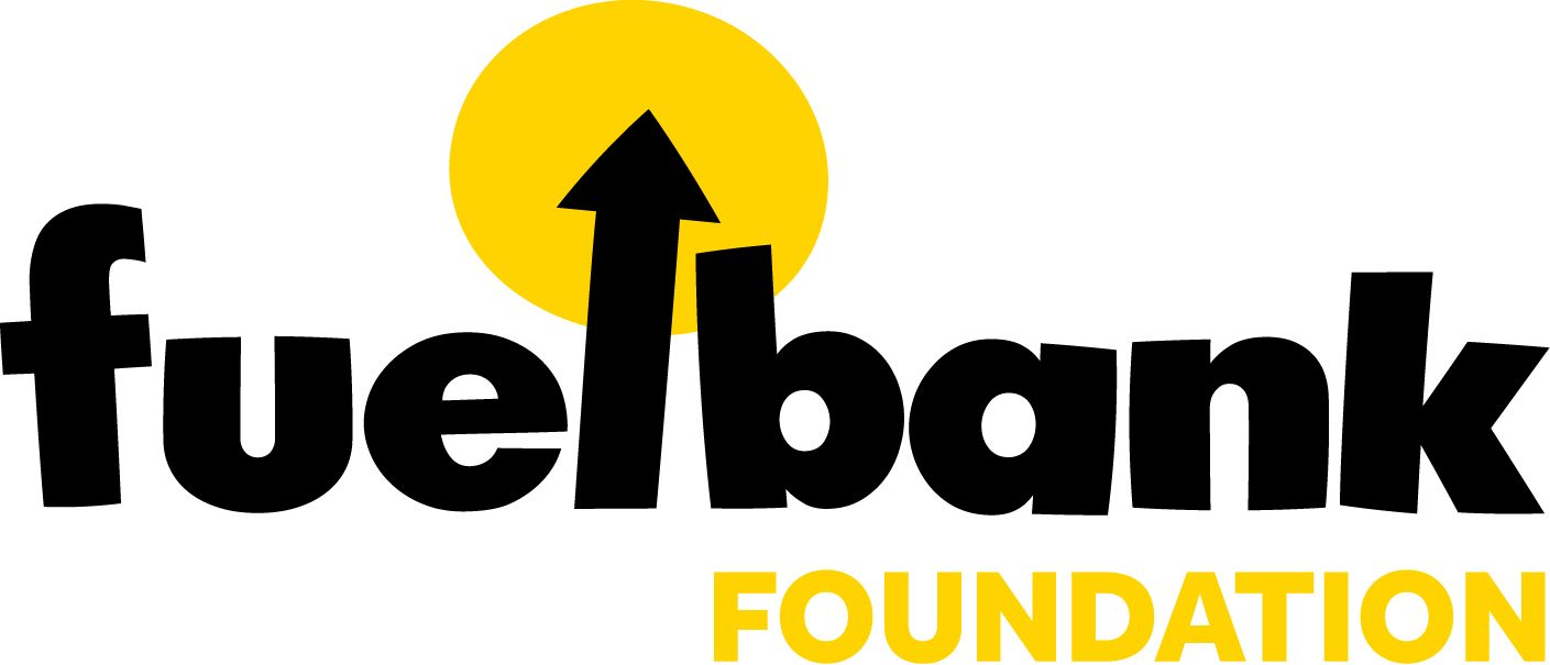 Logo with yellow circle, black upward arrow, and black text that says 'Leading with Love Foundation'