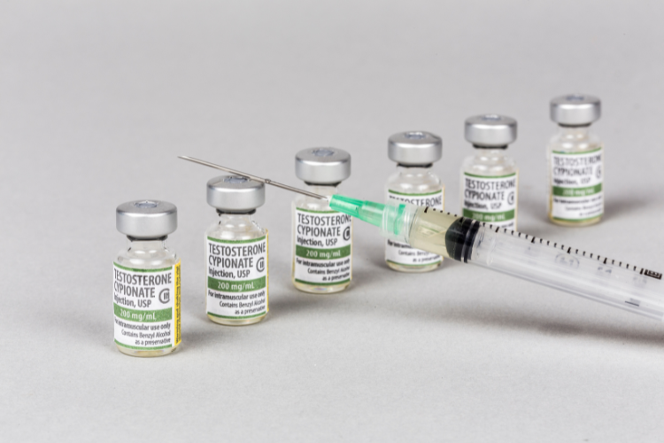 Vials of testosterone cypionate with a syringe