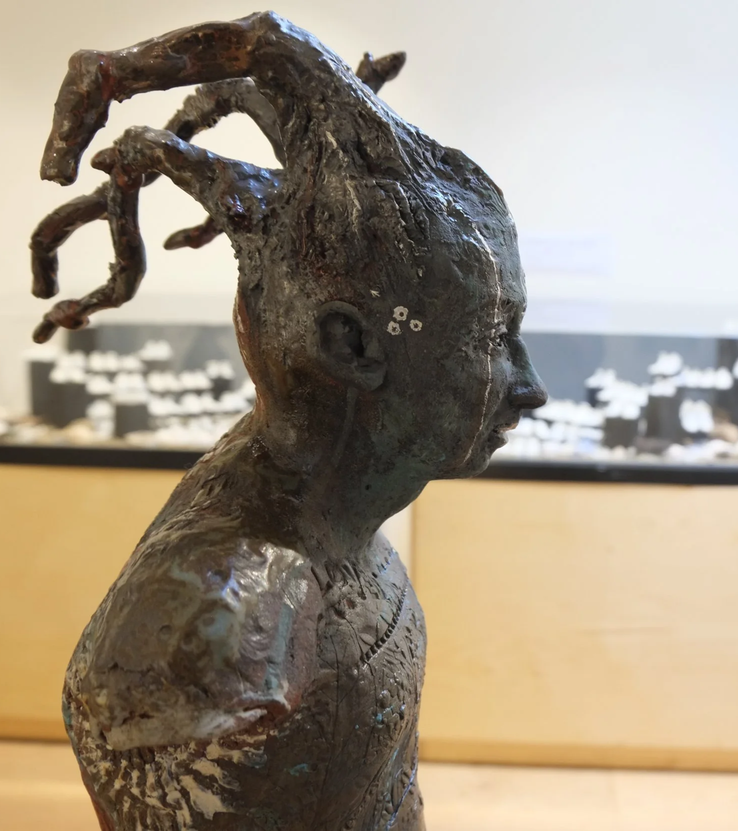 Elli, red stoneware sculpture 30 cms tall. £420. plus UK only P&P
She has a 21 cms high matching Plinth available for £120 extra (total height 59cms)