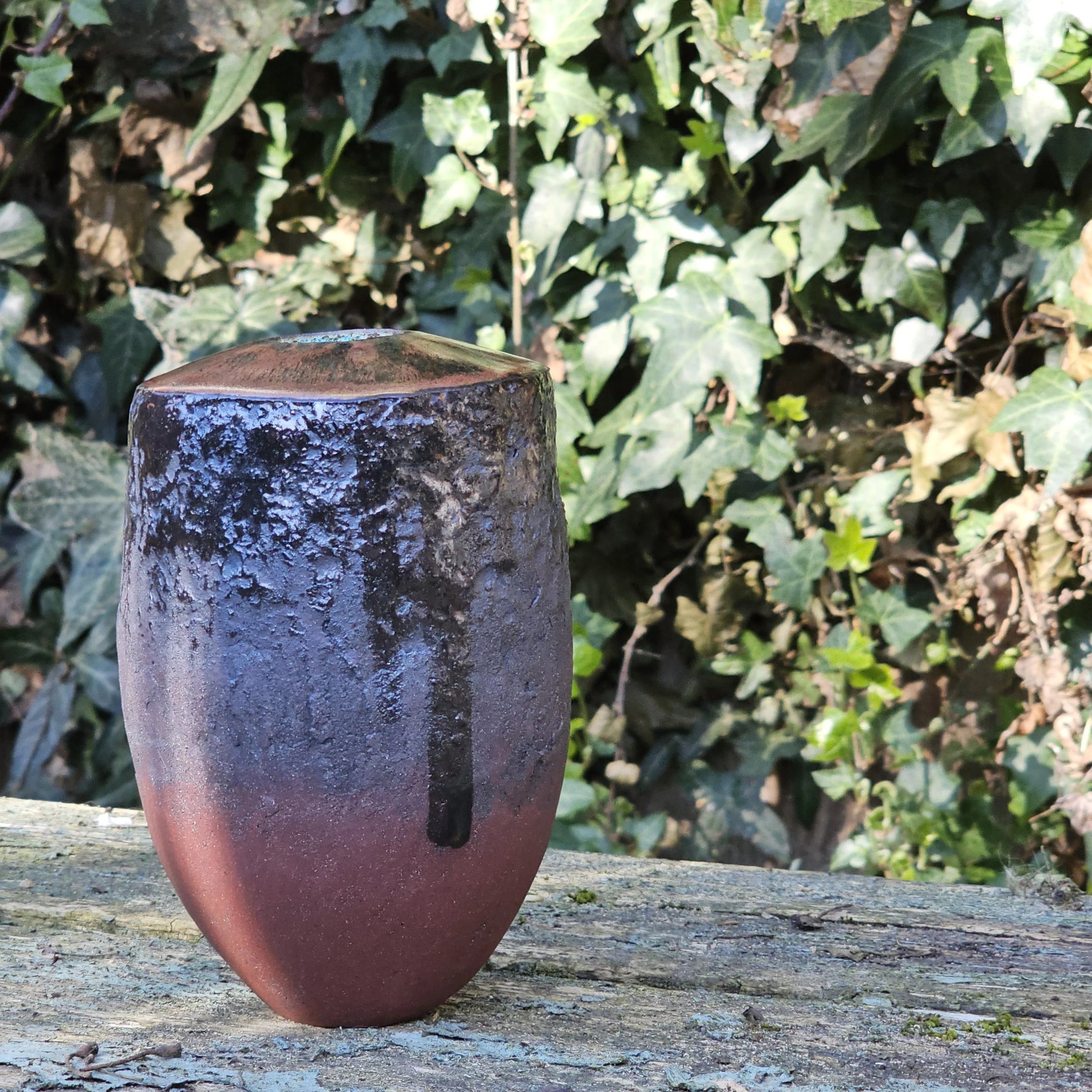 red stoneware  organic raw clay,  turquoise and copper glazes.  £45