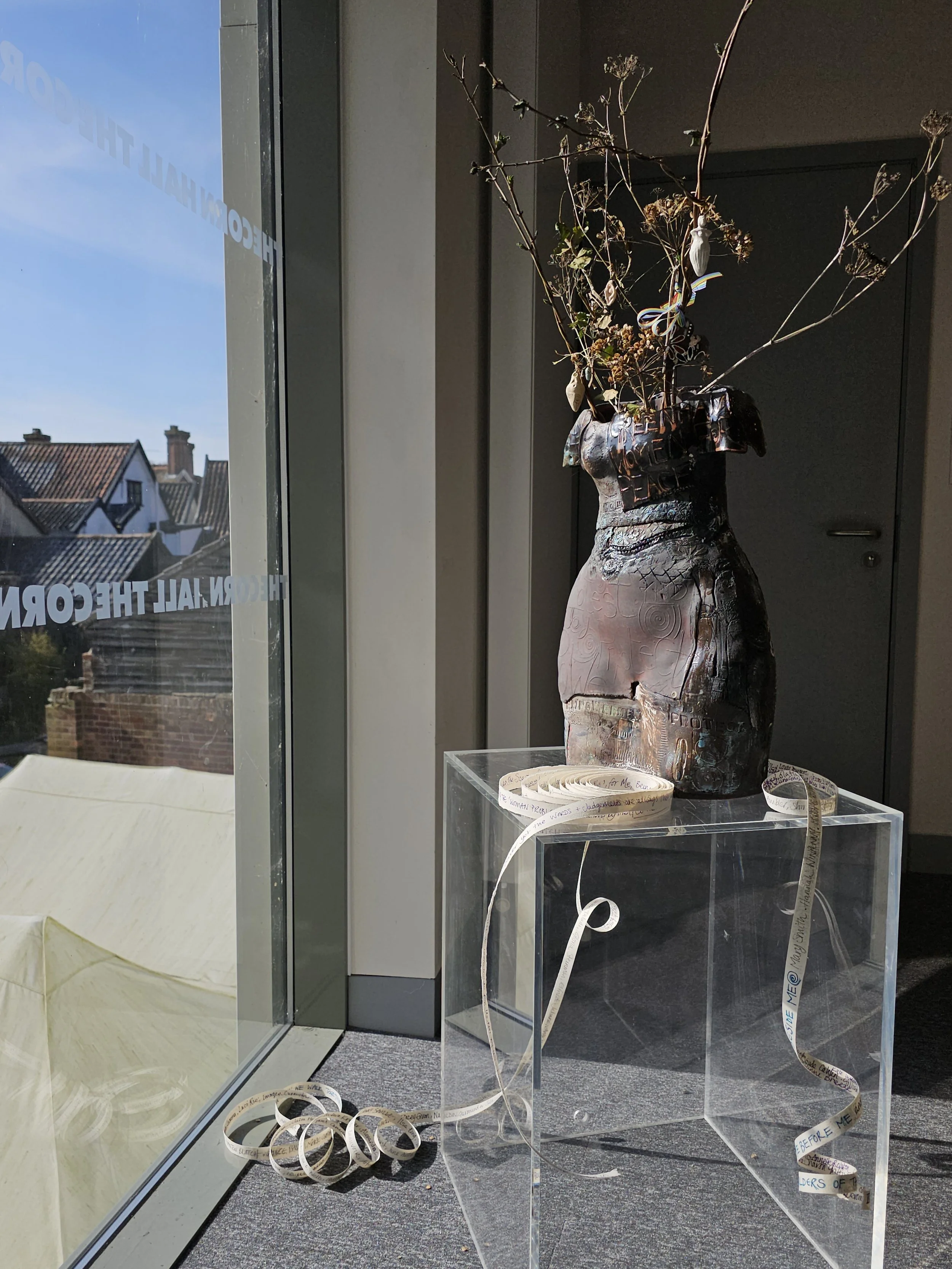 Written on the Skin: red stoneware sculpture vessel with additional small ceramic pieces 58cms high. .