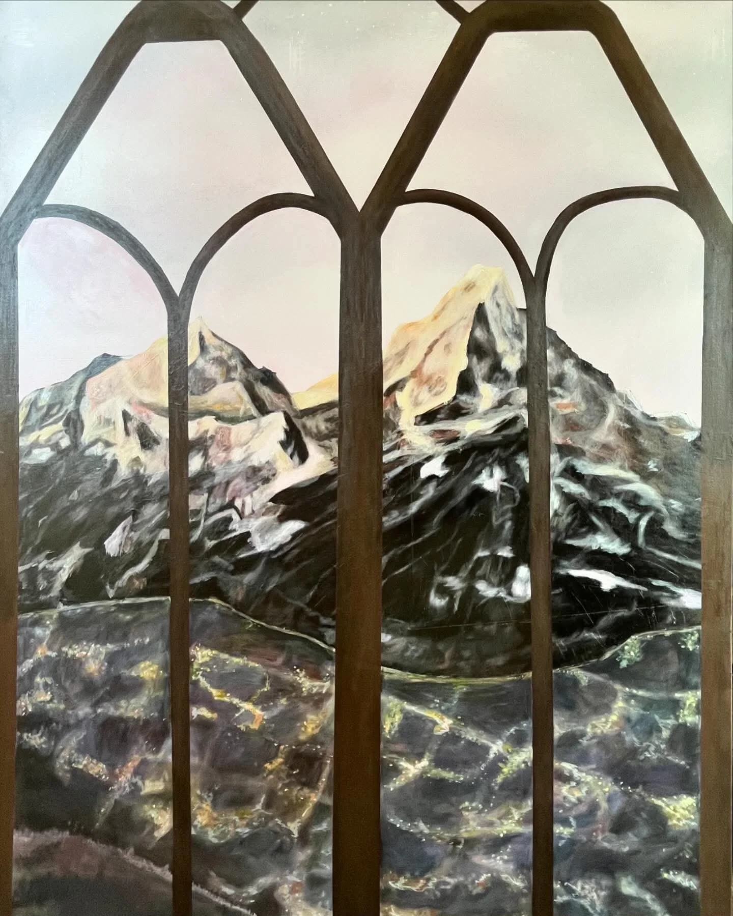 Painting of snow-covered mountain peaks seen through a window with a dark brown decorative frame.
