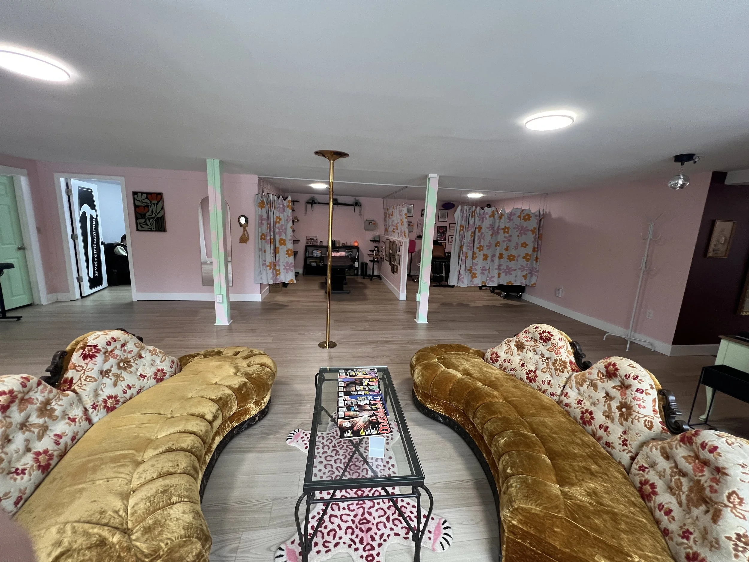 Go down the stairs to the left to find Nicolle, Nikki, and Alexis!