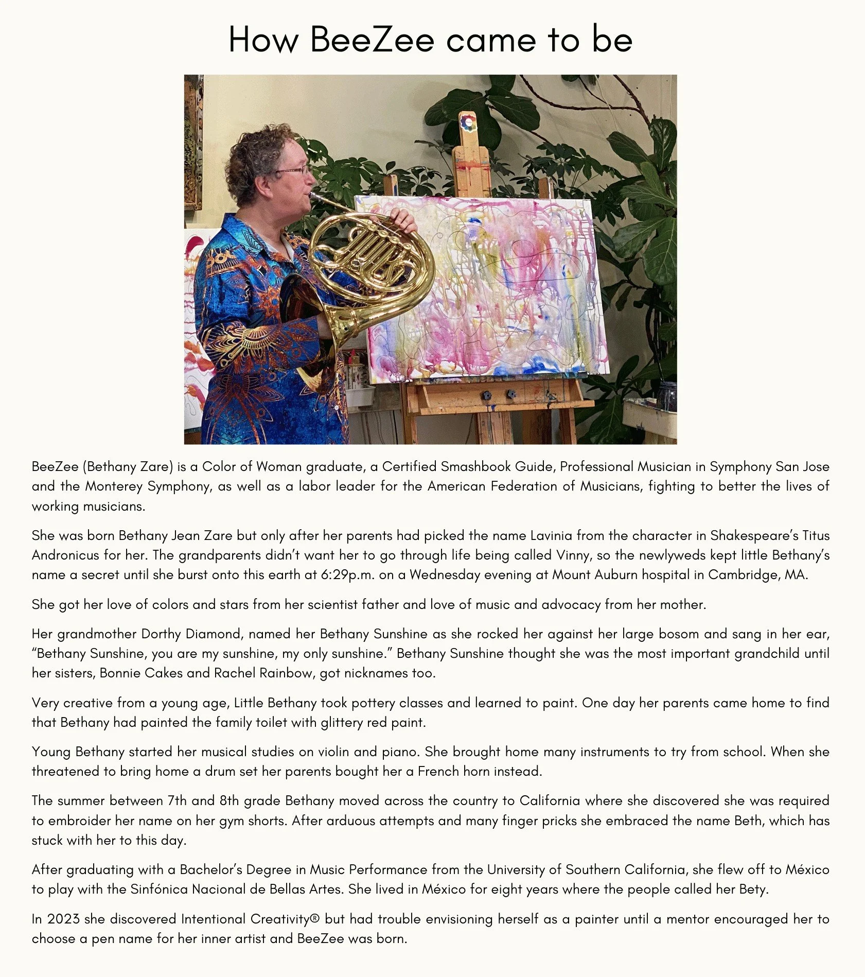 A woman with curly hair playing a French horn in front of an abstract colorful painting on an easel, surrounded by plants in the background.