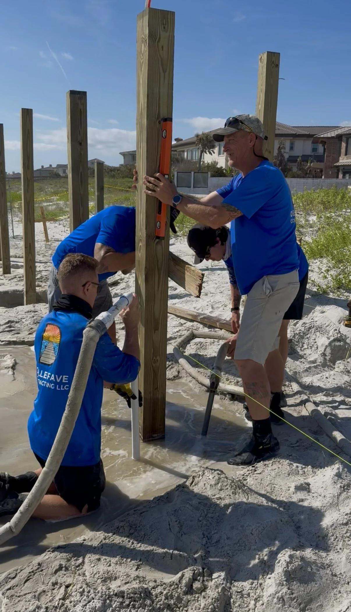 Marine contractors constructing a pier on Daytona Beach