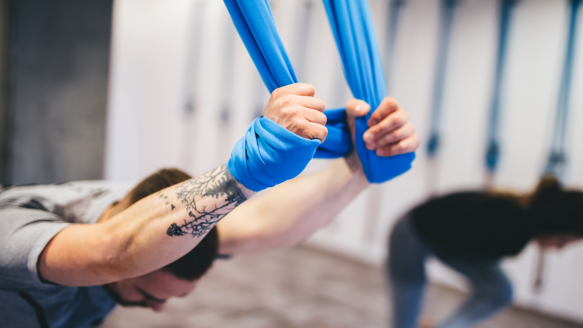 aerial yoga shoulder stretch