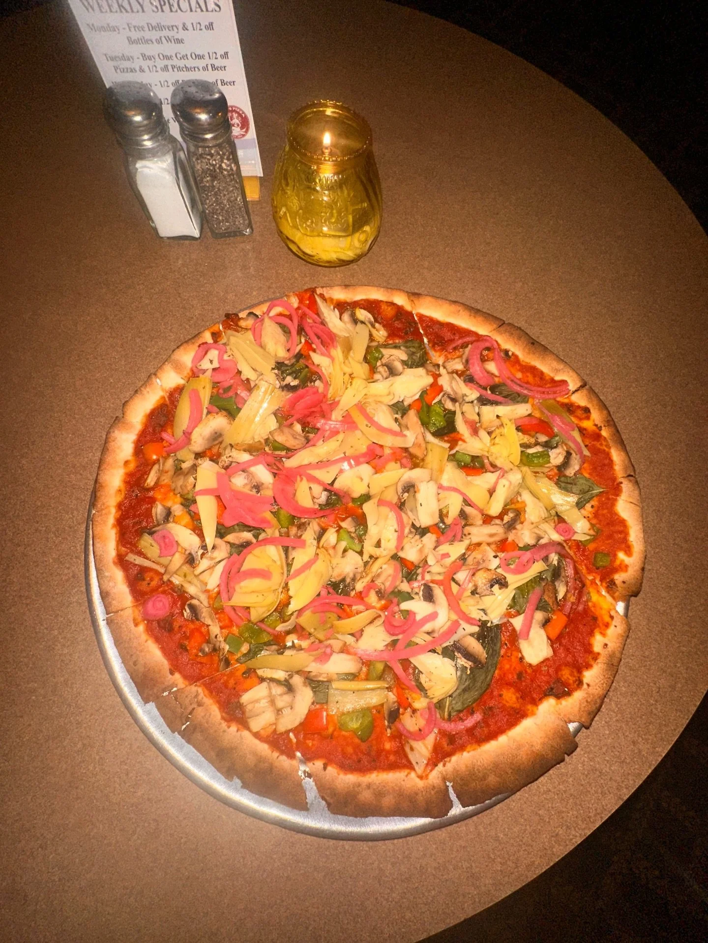 Craving something fresh, flavorful, and totally plant-powered? 🌿🍕
At Lisa&rsquo;s Pizza, our vegan-friendly creation starts with our signature dough &mdash; soft, hand-stretched, and baked to perfection. We top it with our house-made marinara and p