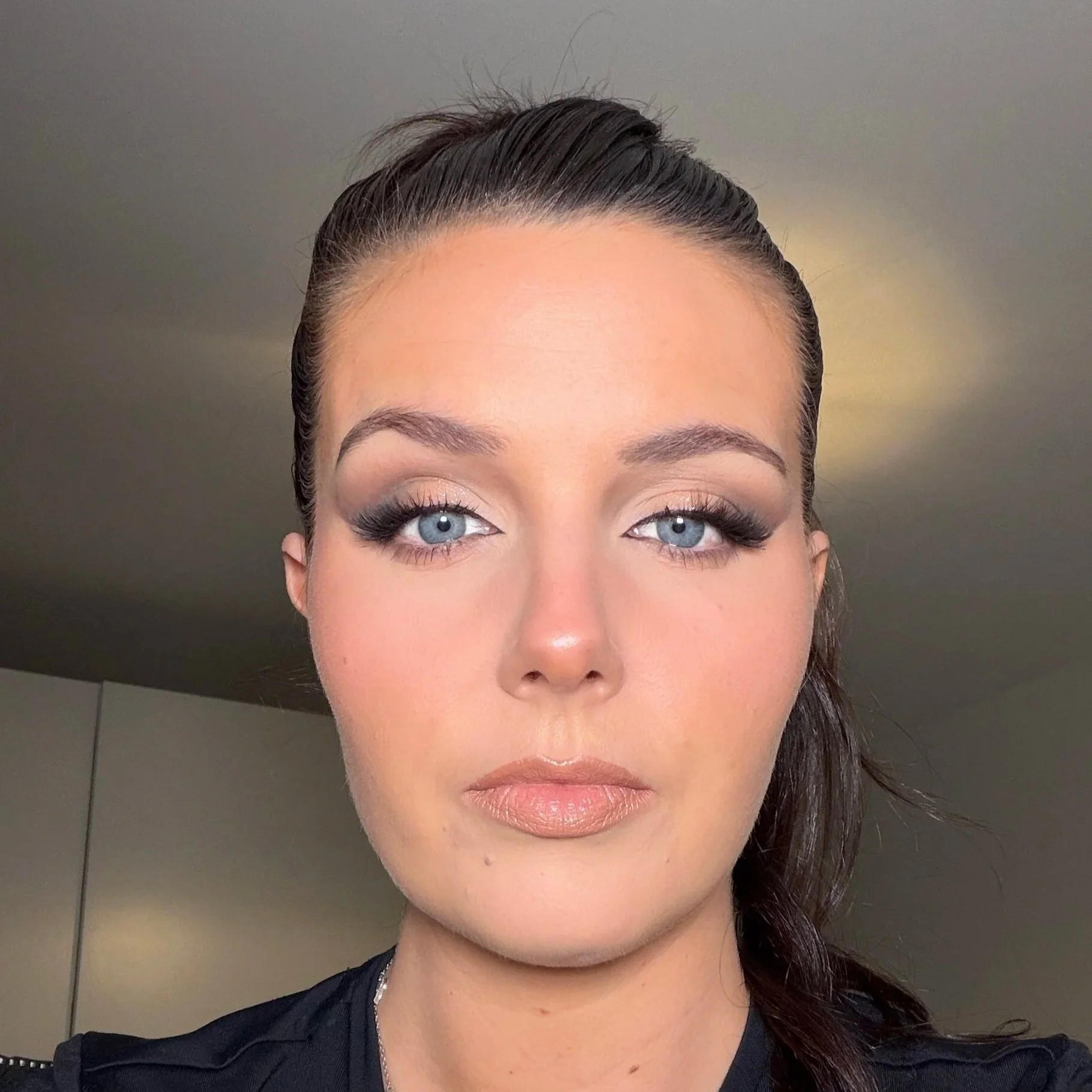 Glam smokey winged eye shadow make up, blue eyes