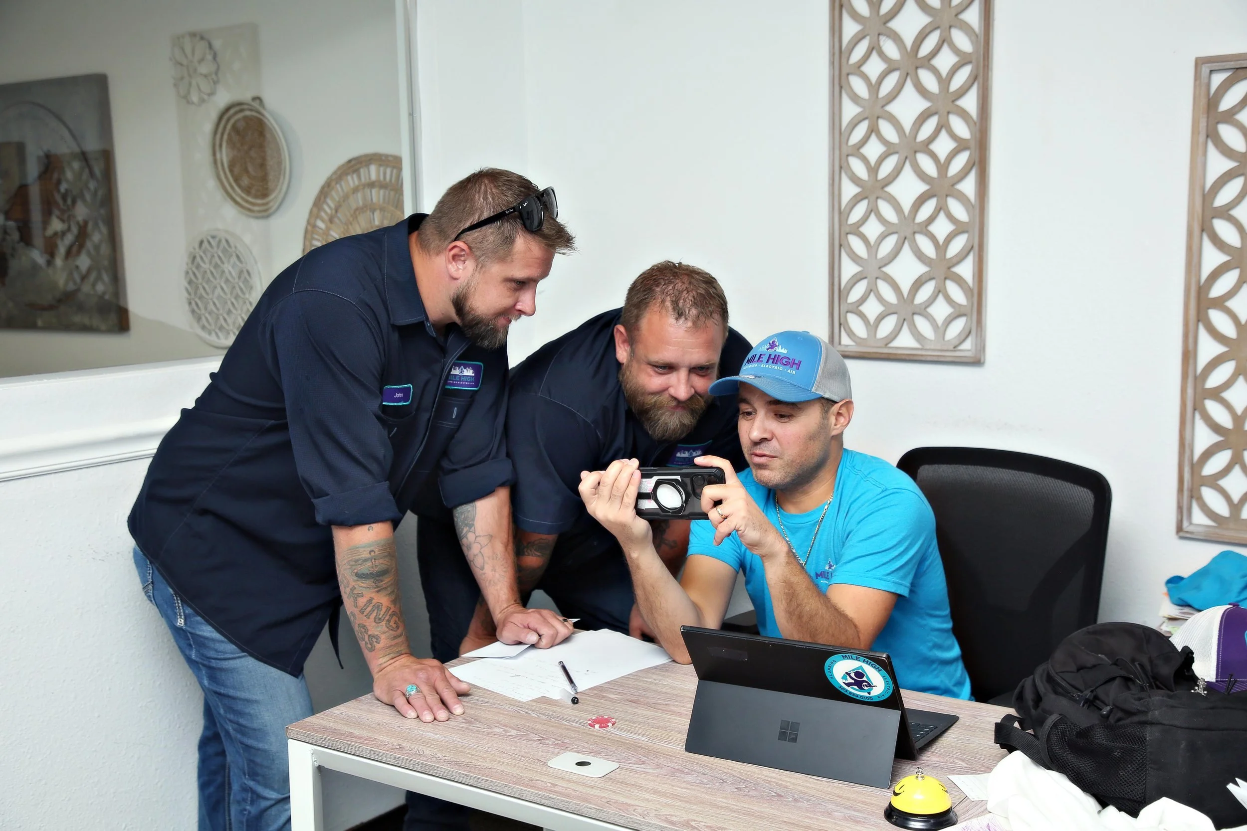 plumbers looking at a leak